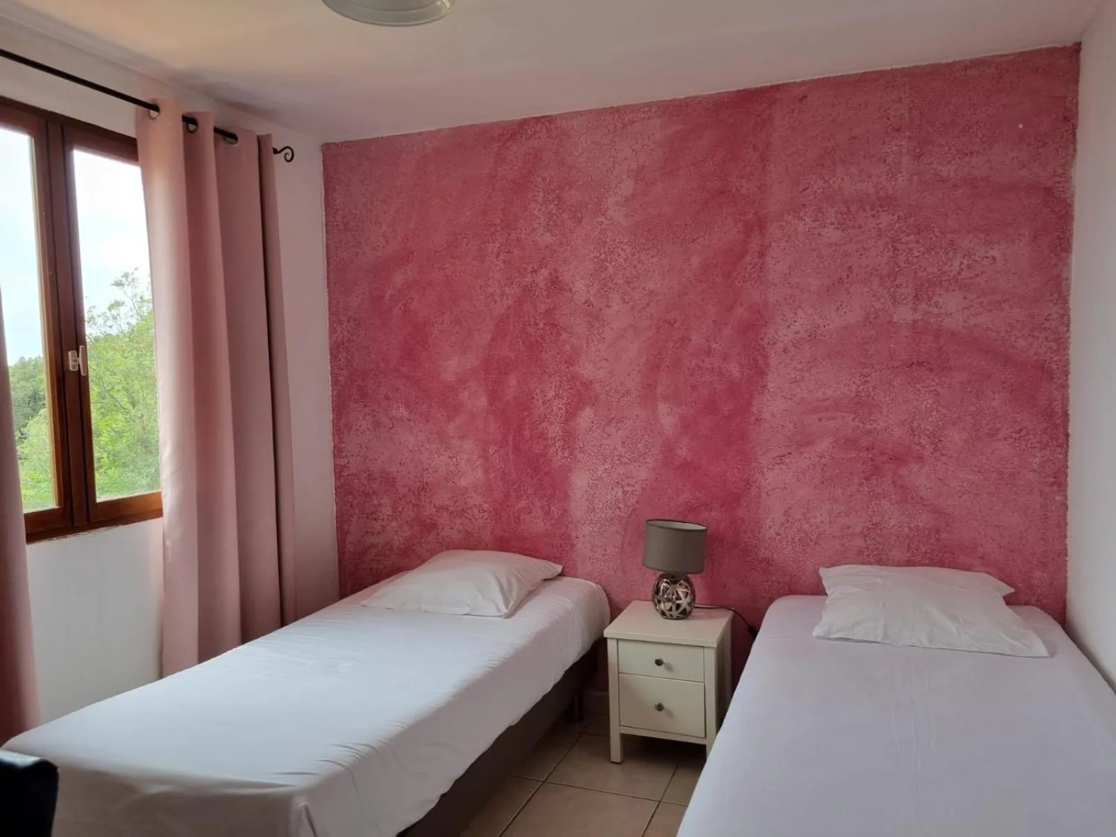 Bed in Bungalows Du Maquis