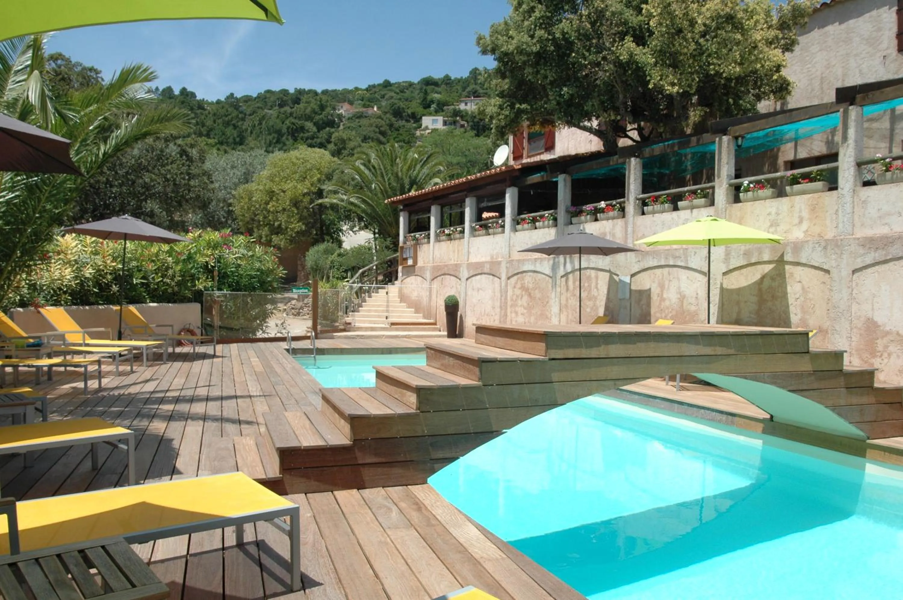 Pool view in Bungalows Du Maquis