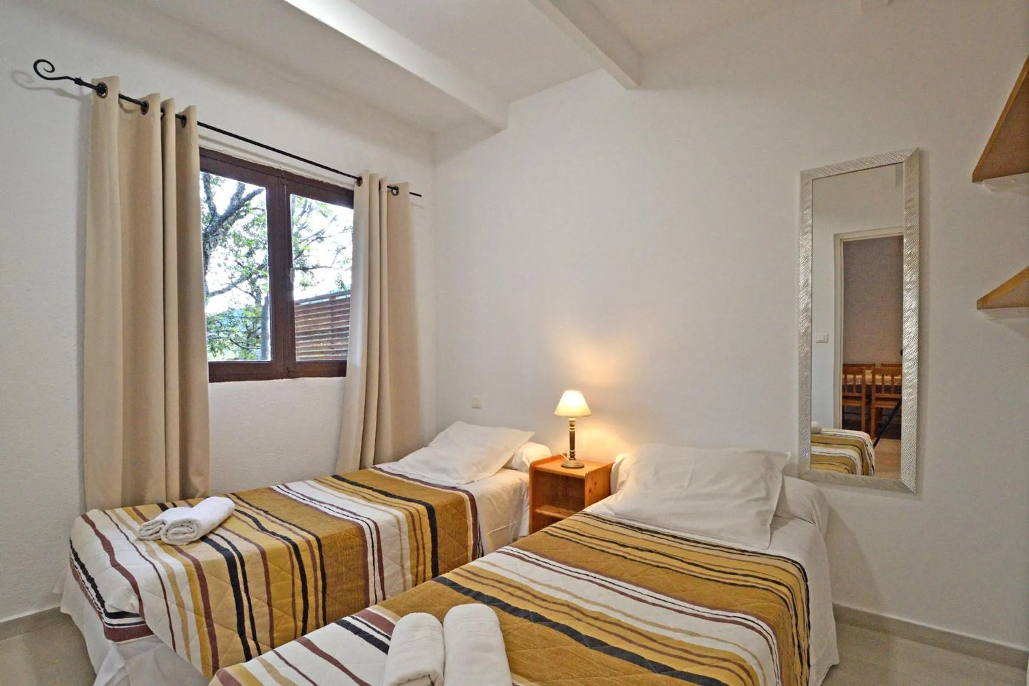 Bed in Bungalows Du Maquis