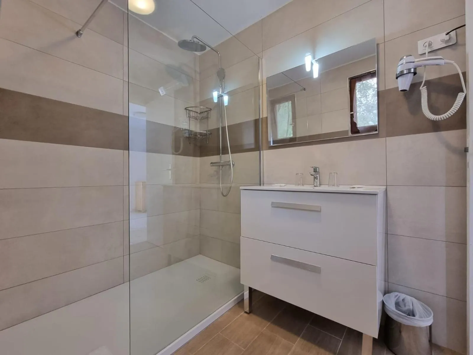 Shower in Bungalows Du Maquis