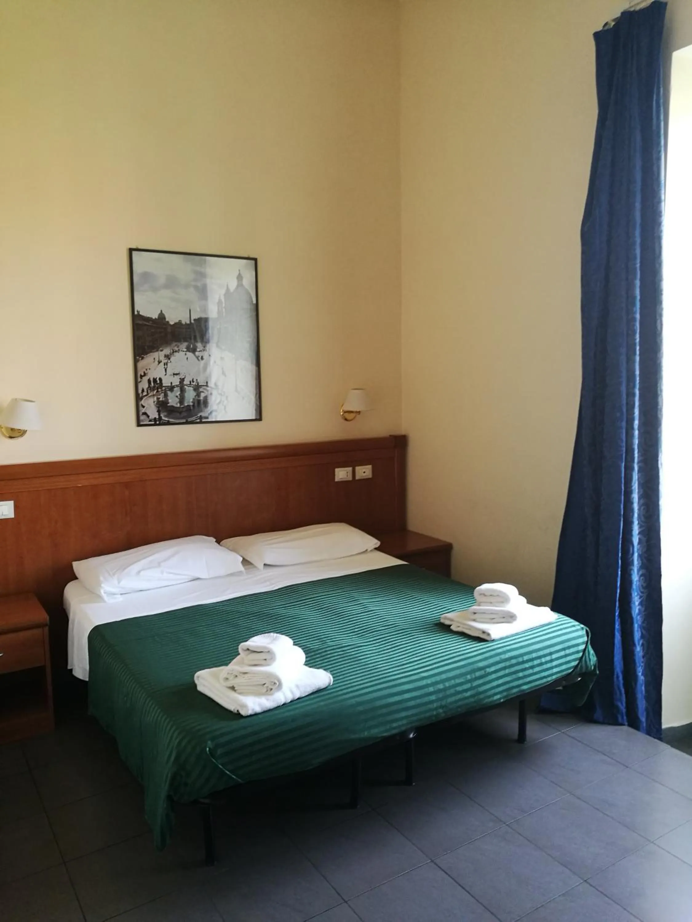 Bed in Palma Residences In Rome
