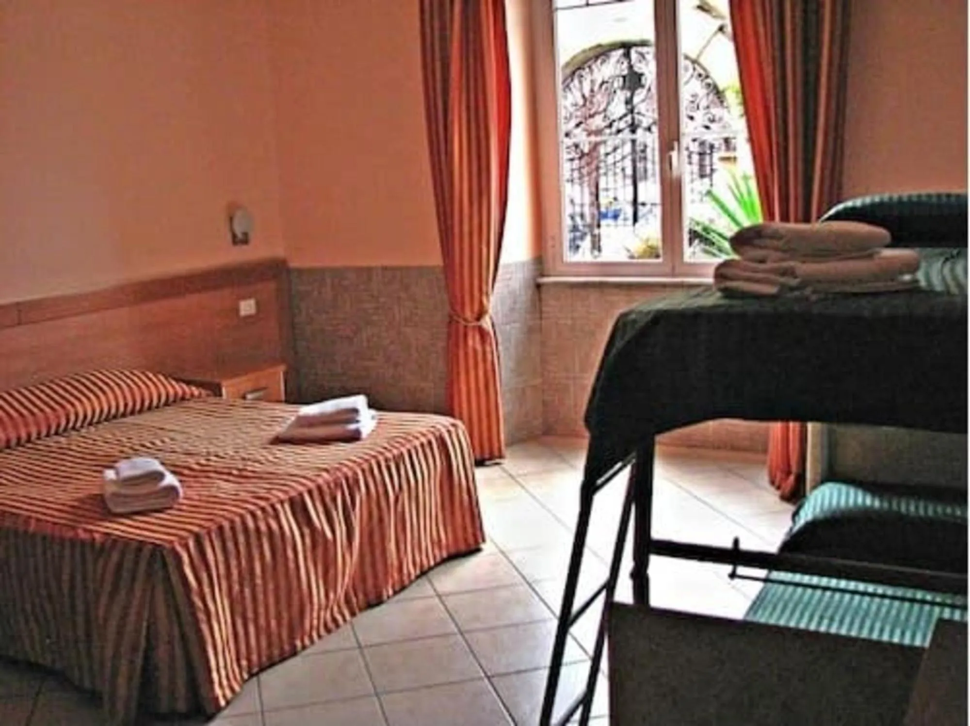 Bed in Palma Residences In Rome
