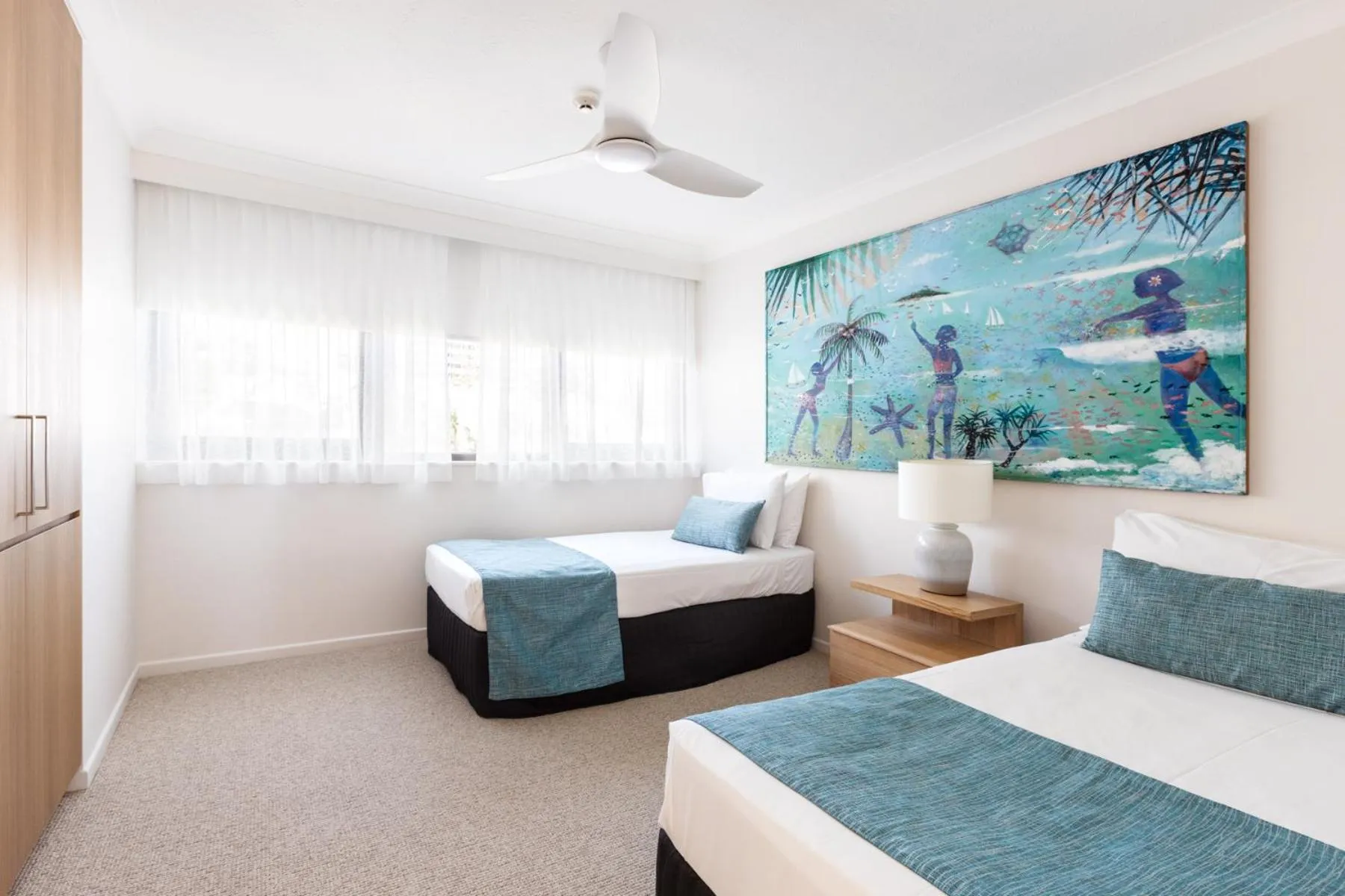 Bed in Columbia Beachfront Apartments on Rainbow Bay