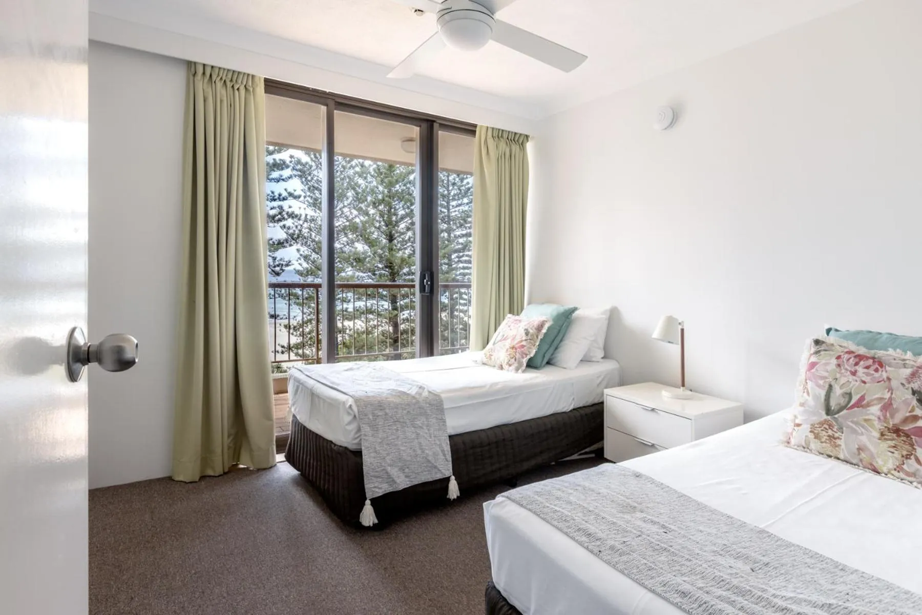 Bed in Columbia Beachfront Apartments on Rainbow Bay