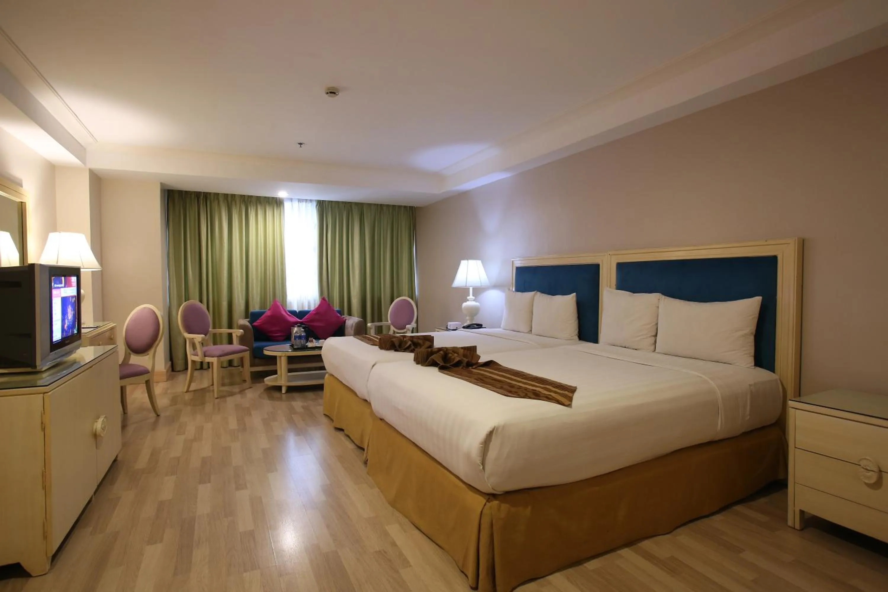 Bed in Crown Regency Hotel & Towers