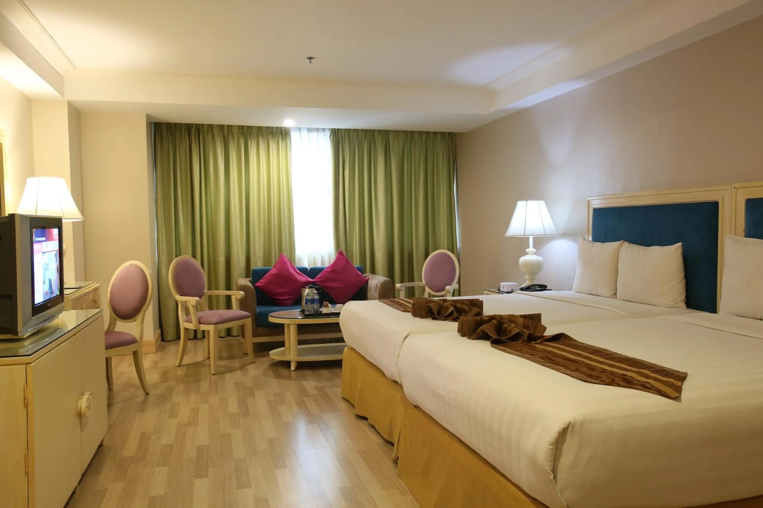 Photo of the whole room, Bed in Crown Regency Hotel & Towers