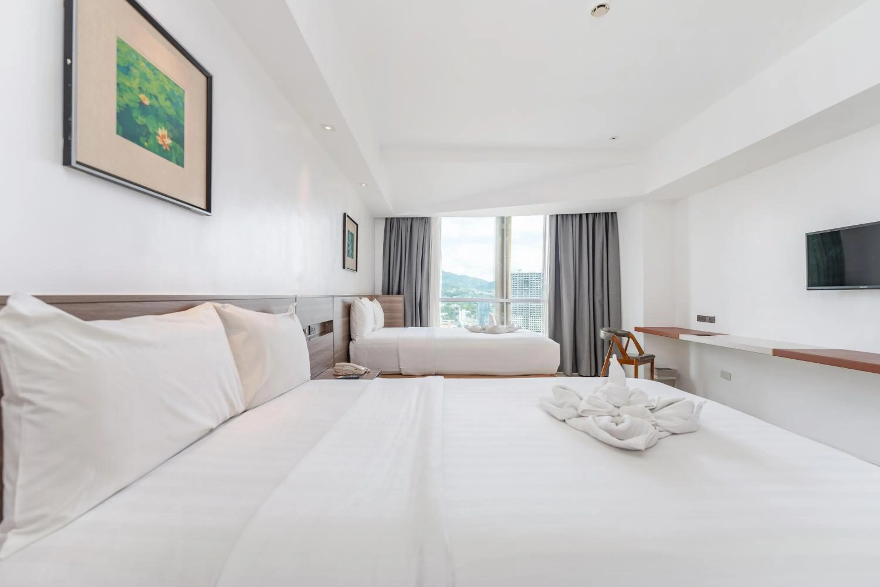 Bed in Crown Regency Hotel & Towers