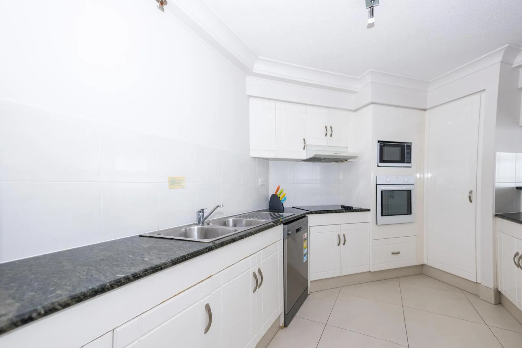 Kitchen or kitchenette in Burleigh Surf Apartments
