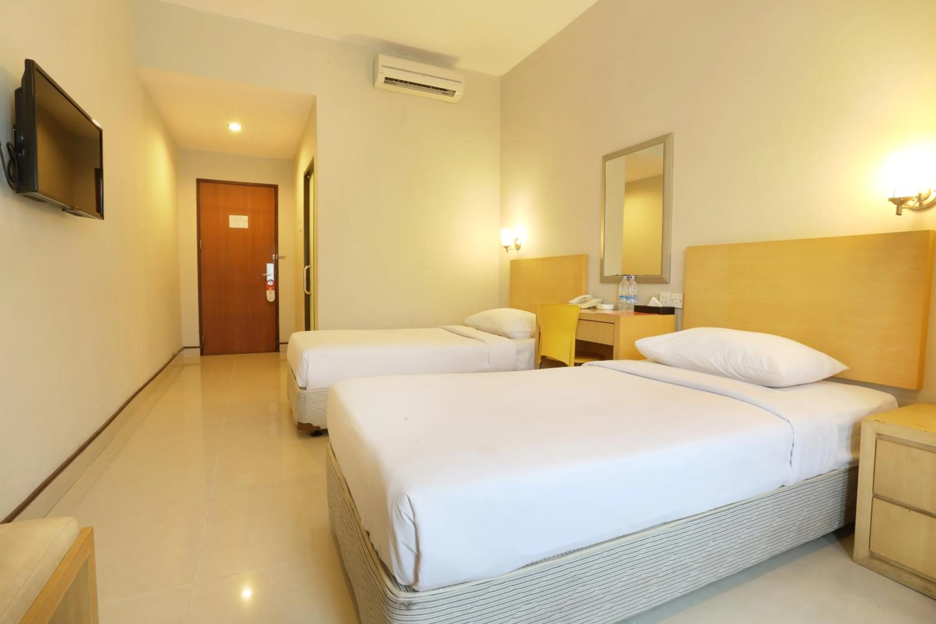 Bed in Triniti Hotel Batam