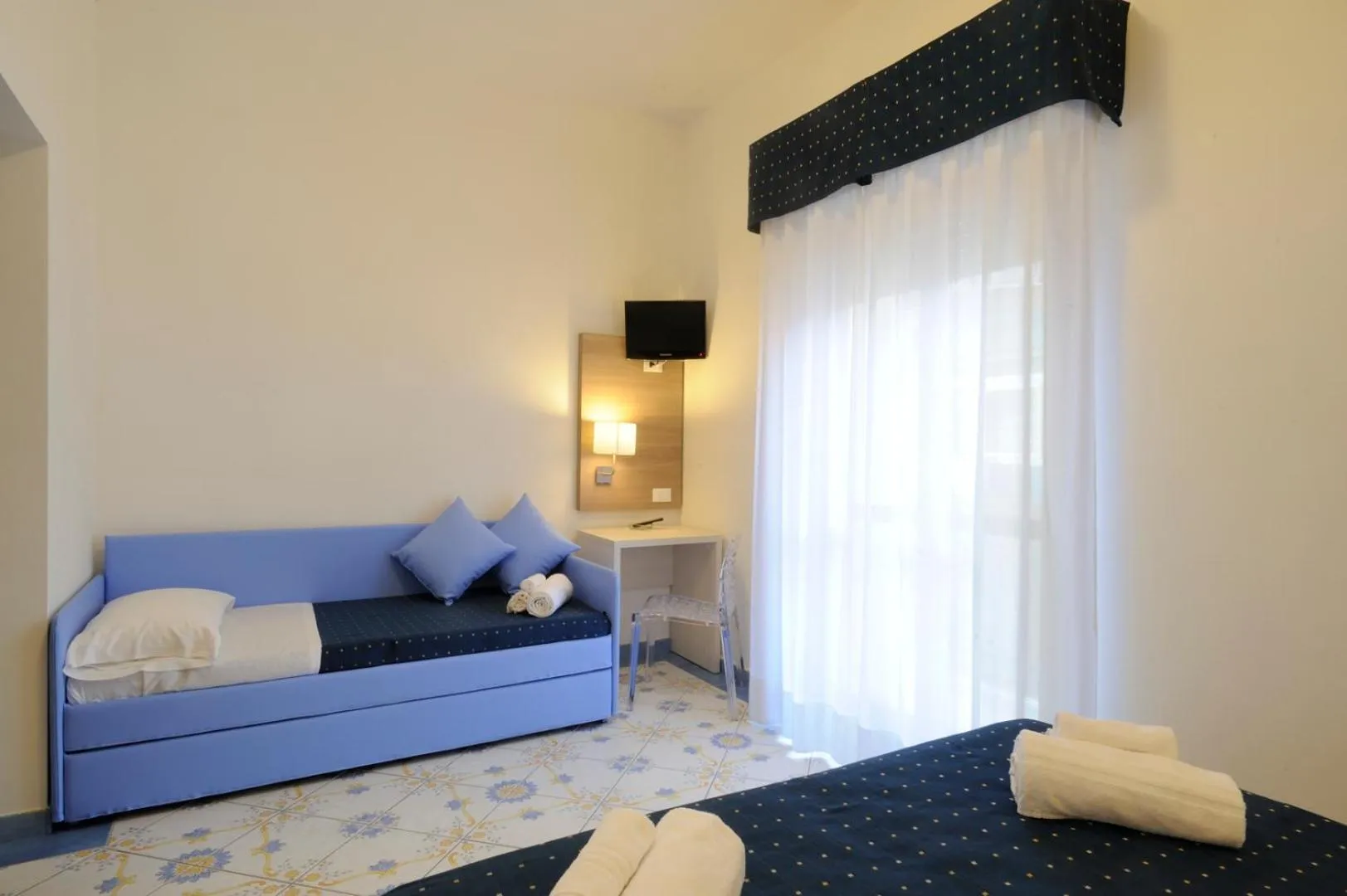 Decorative detail, Bed in Hotel Delfino