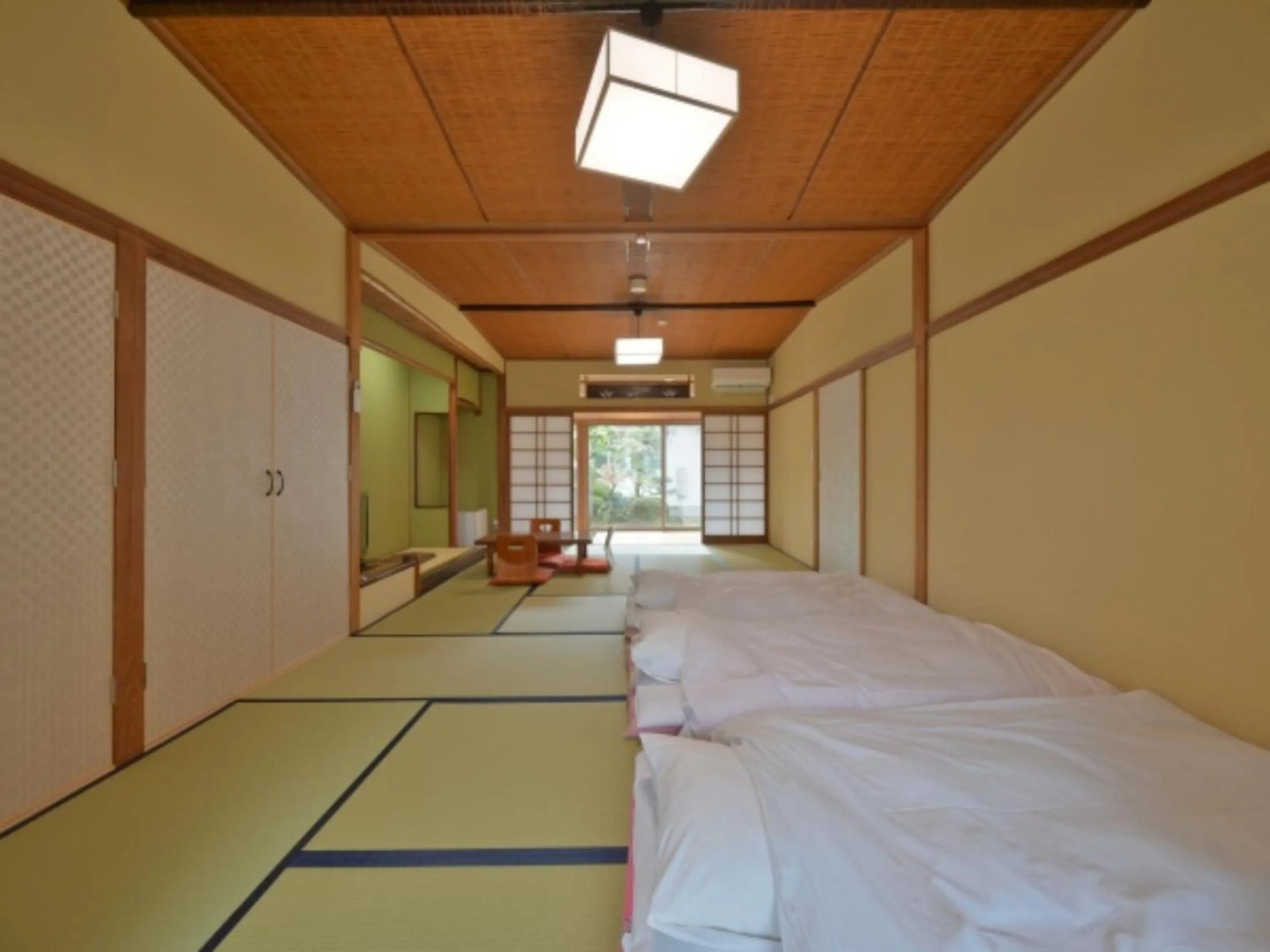 Bed in Wakariki Ryokan