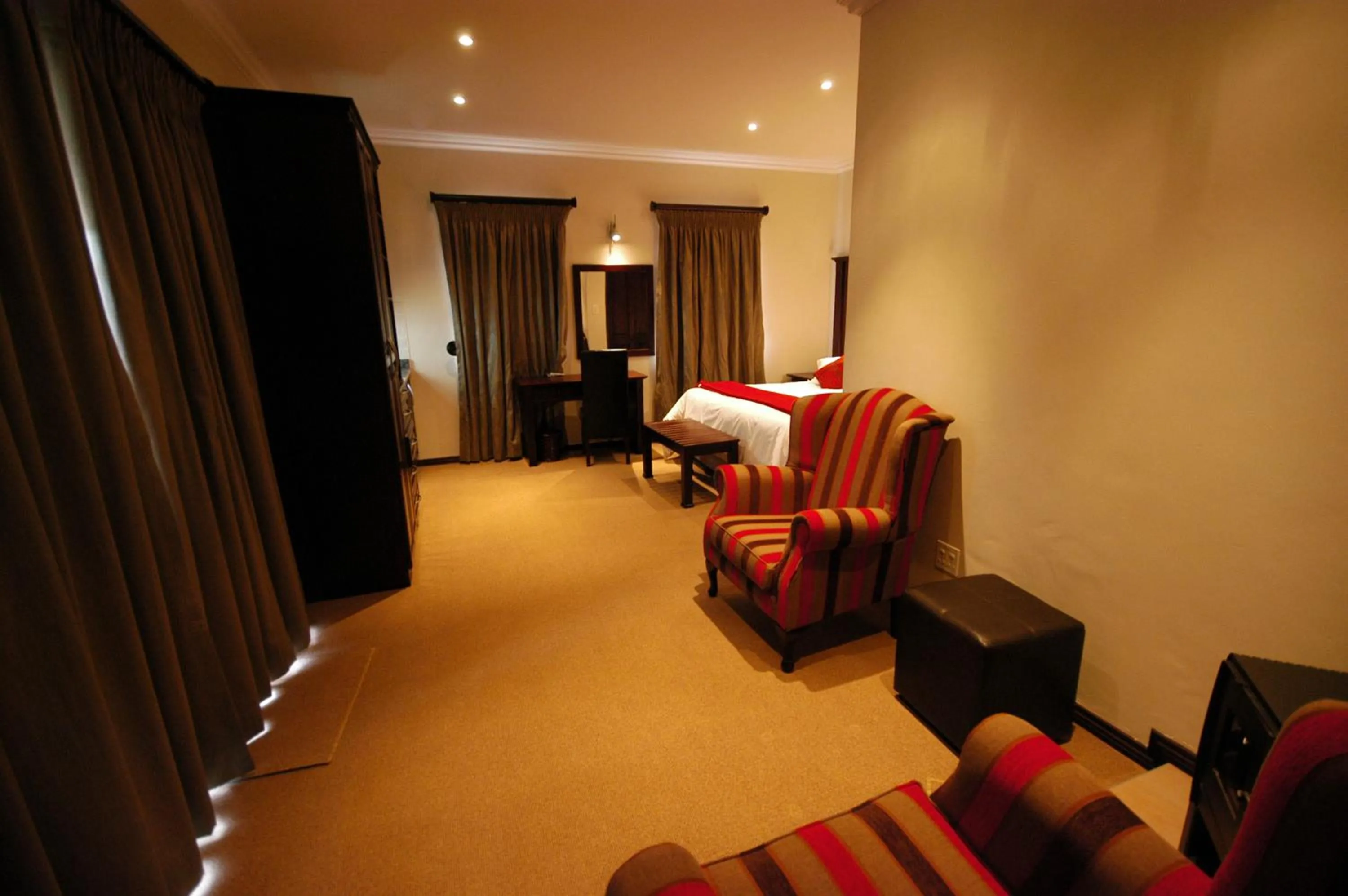 Seating area, Bed in Heidelberg Kloof Lodge