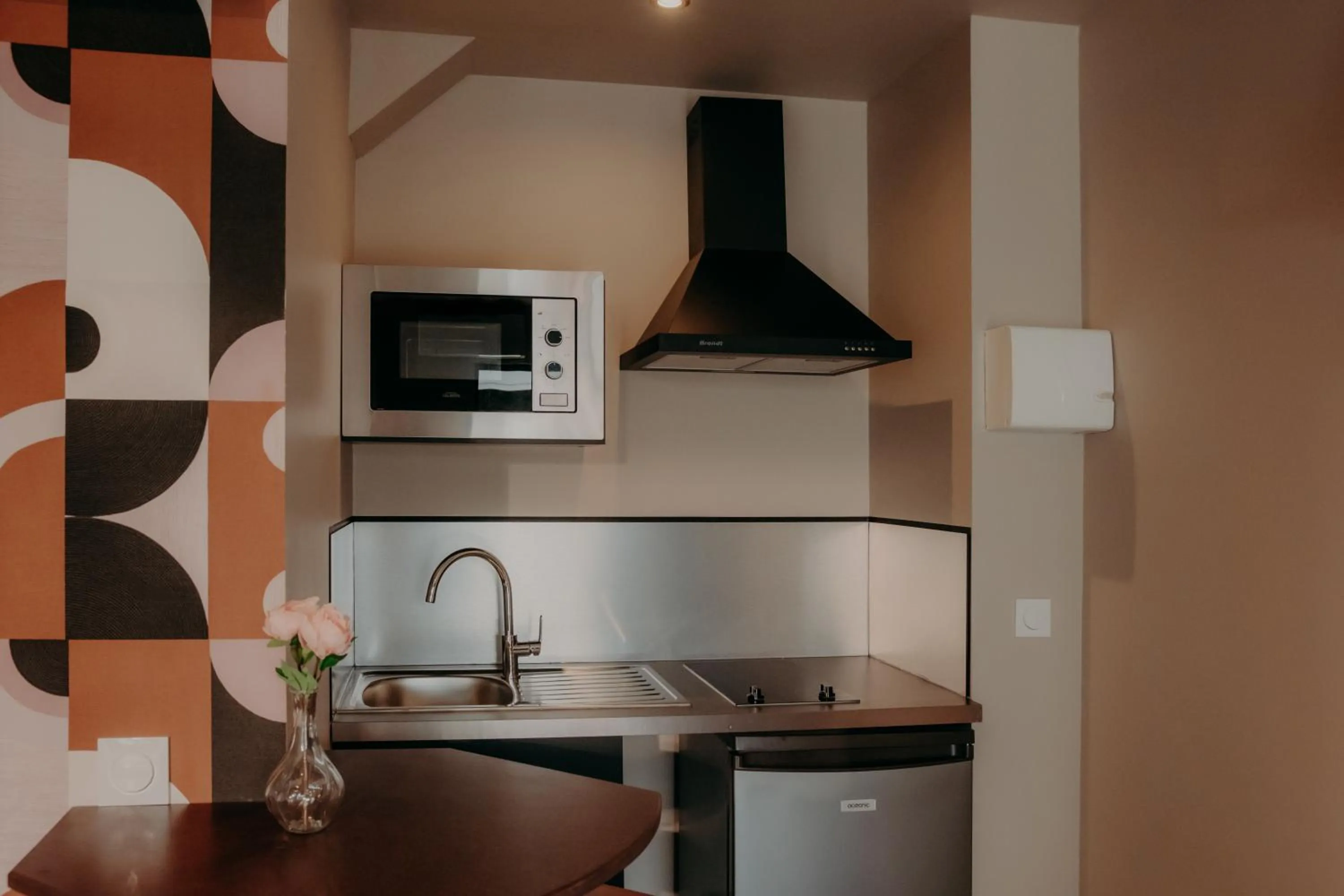 Kitchen or kitchenette in Le Central Hôtel-Bar