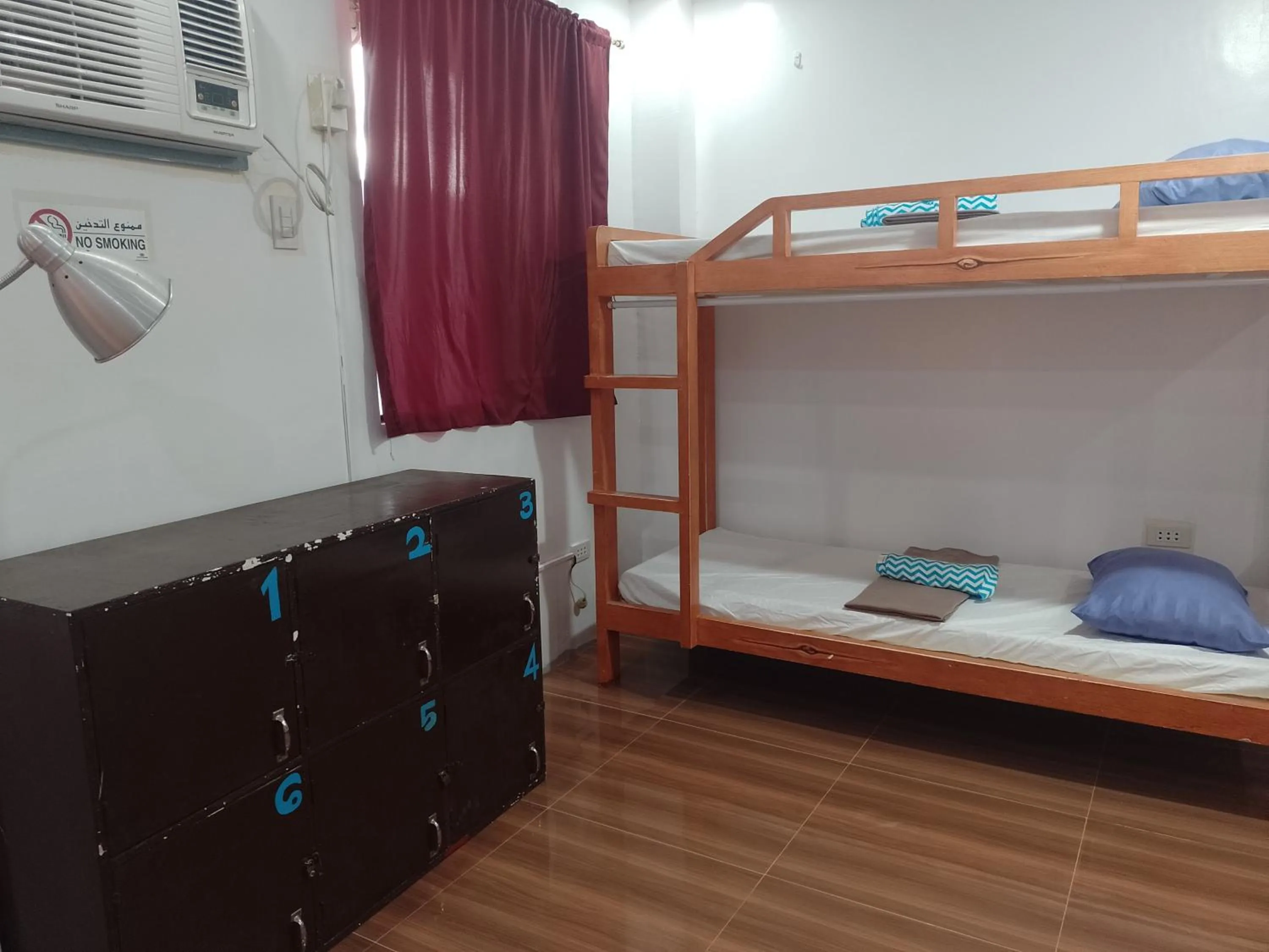 Bed in Angler's Hub & Resort Oslob