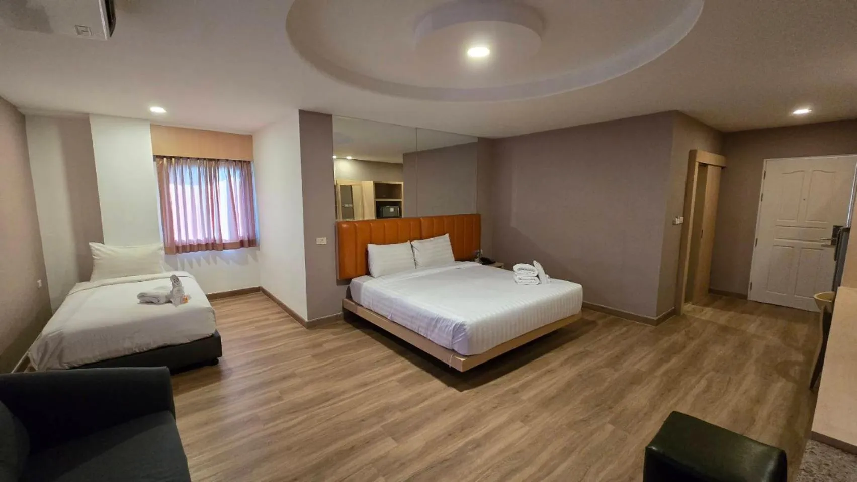 Bed in Grand Tara Garden Thai Hotel