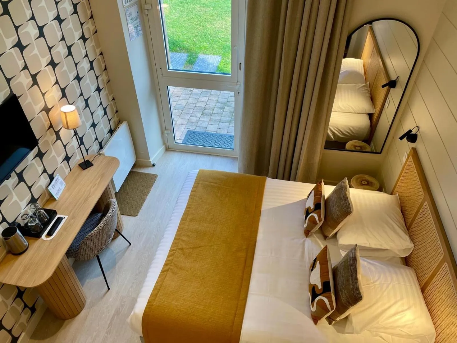 Bed in Hôtel Les Costans, The Originals Relais