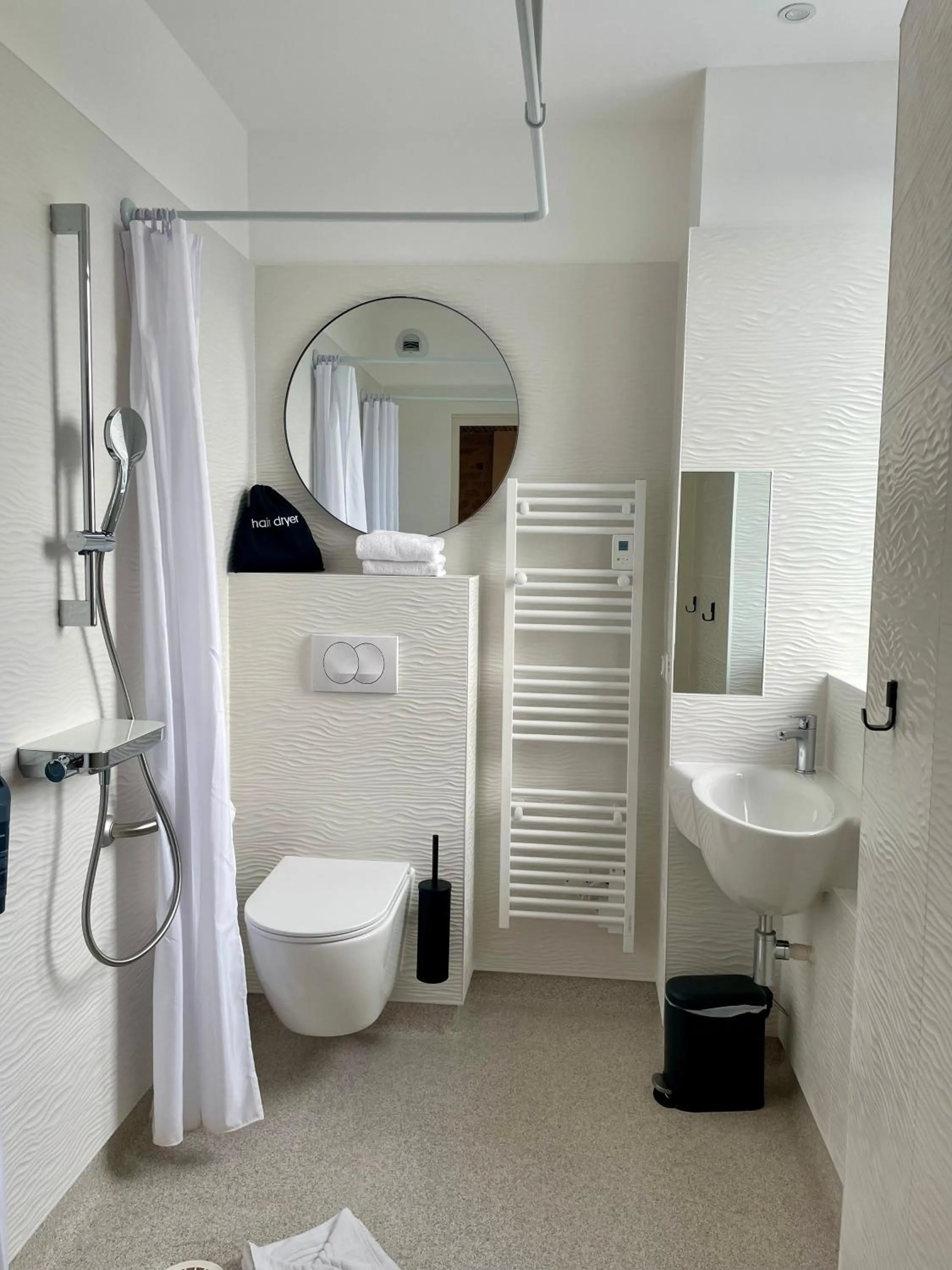 Shower in Hôtel Les Costans, The Originals Relais