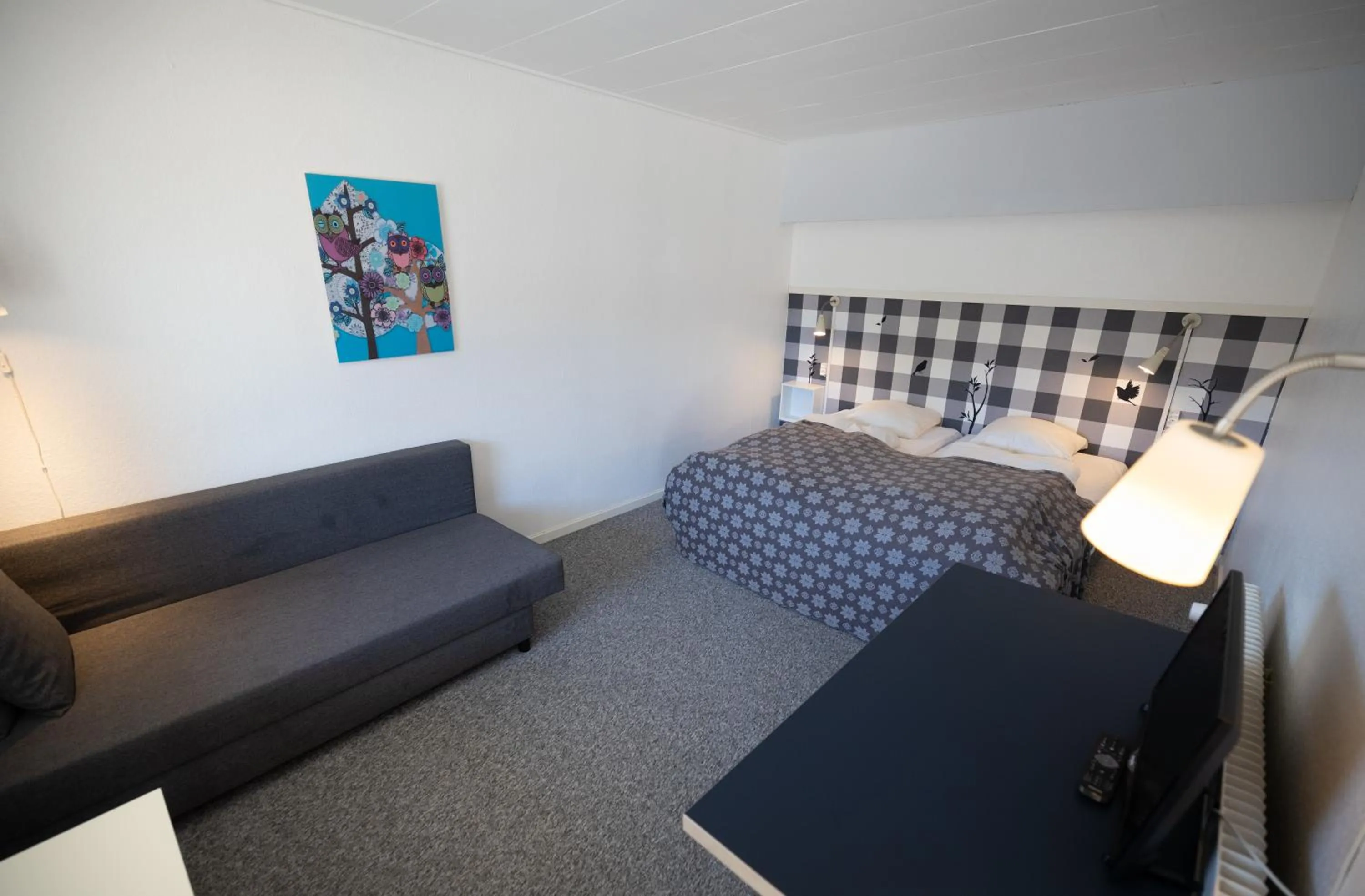 Photo of the whole room, Bed in Tylstrup Kro og Motel