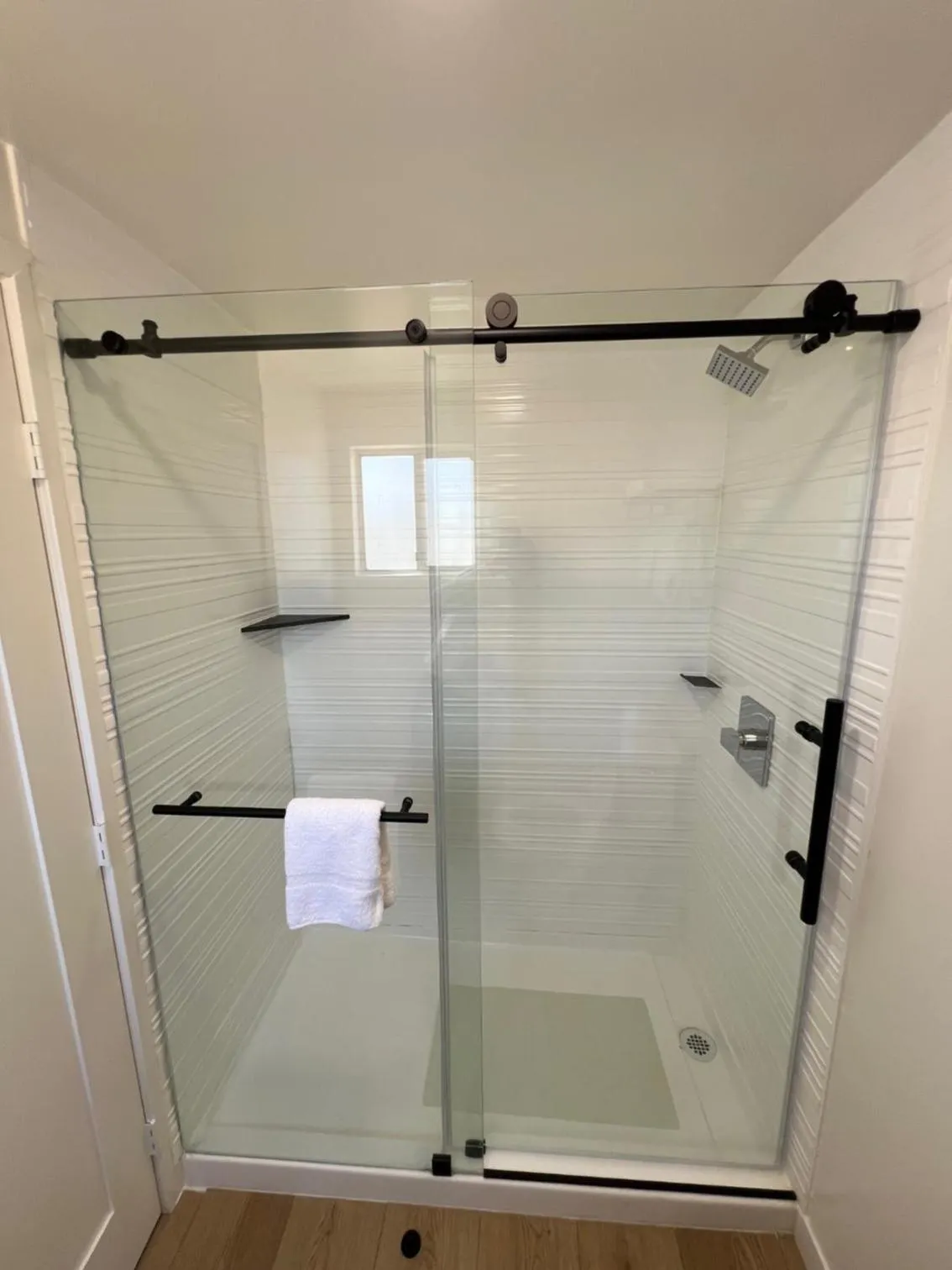 Shower in Lamp Liter Inn Visalia, an Ascend Collection Hotel