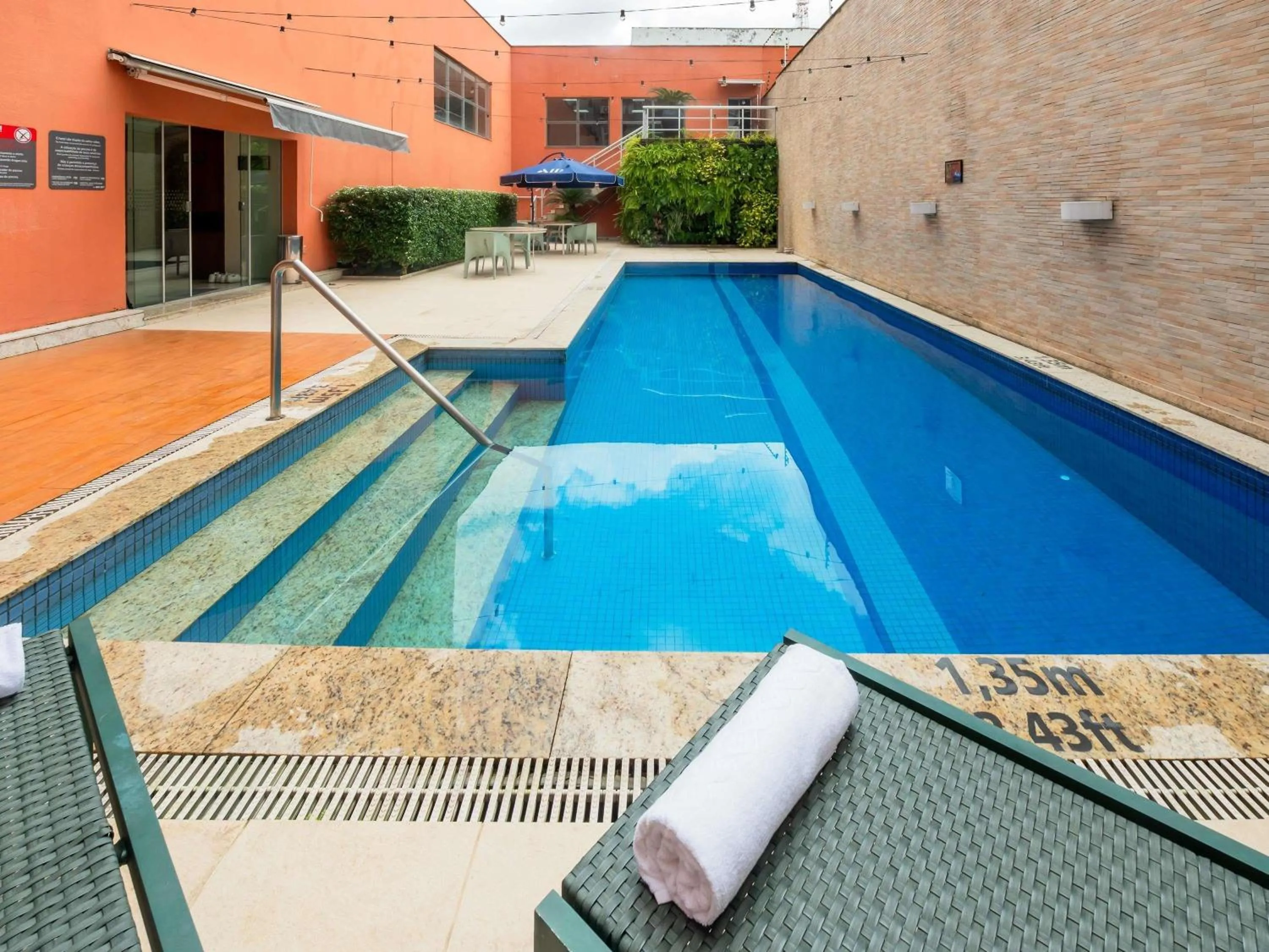 Pool view in ibis Styles Belem Nazare