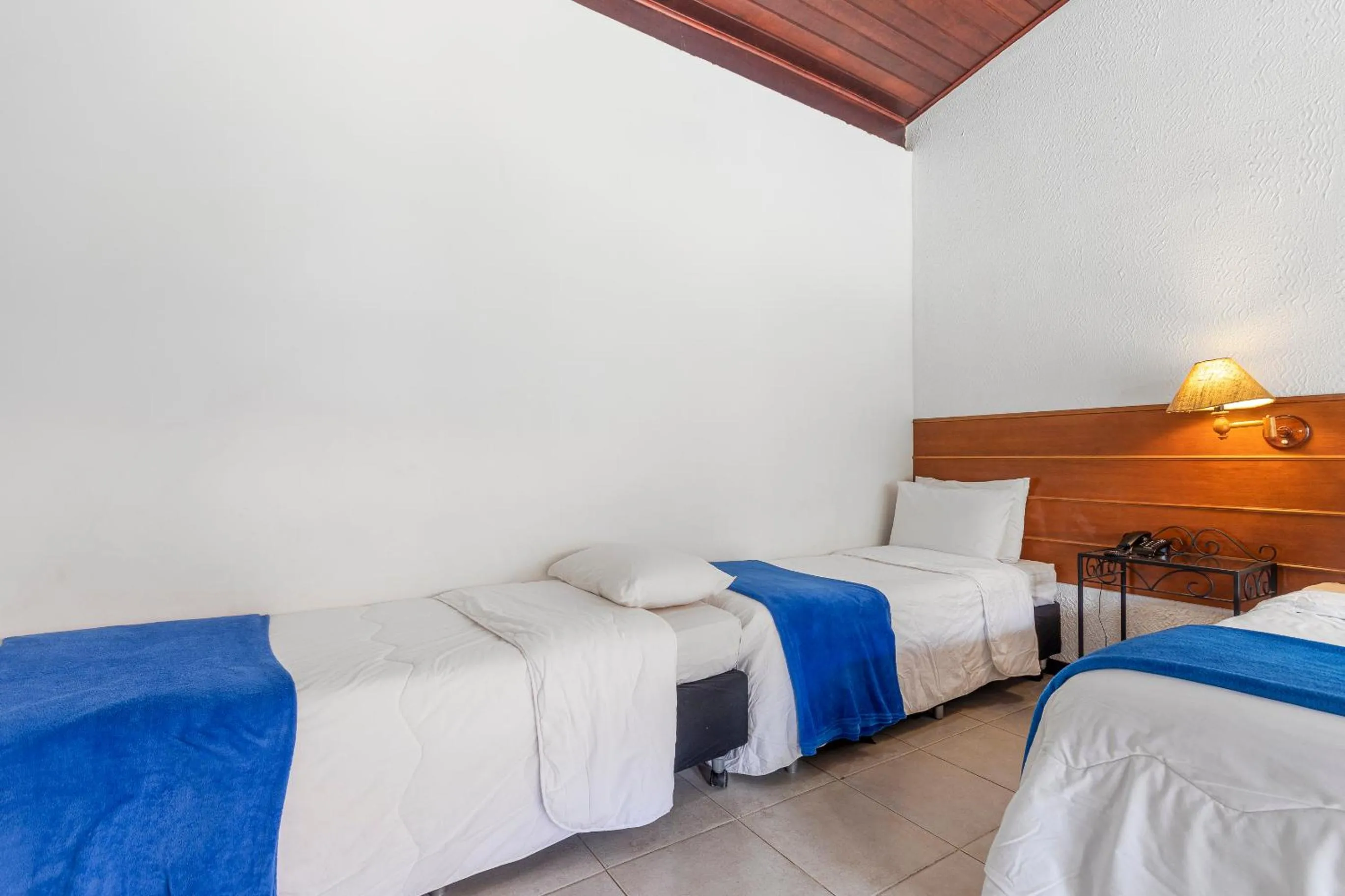 Bed in Hotel Ilha Branca Inn