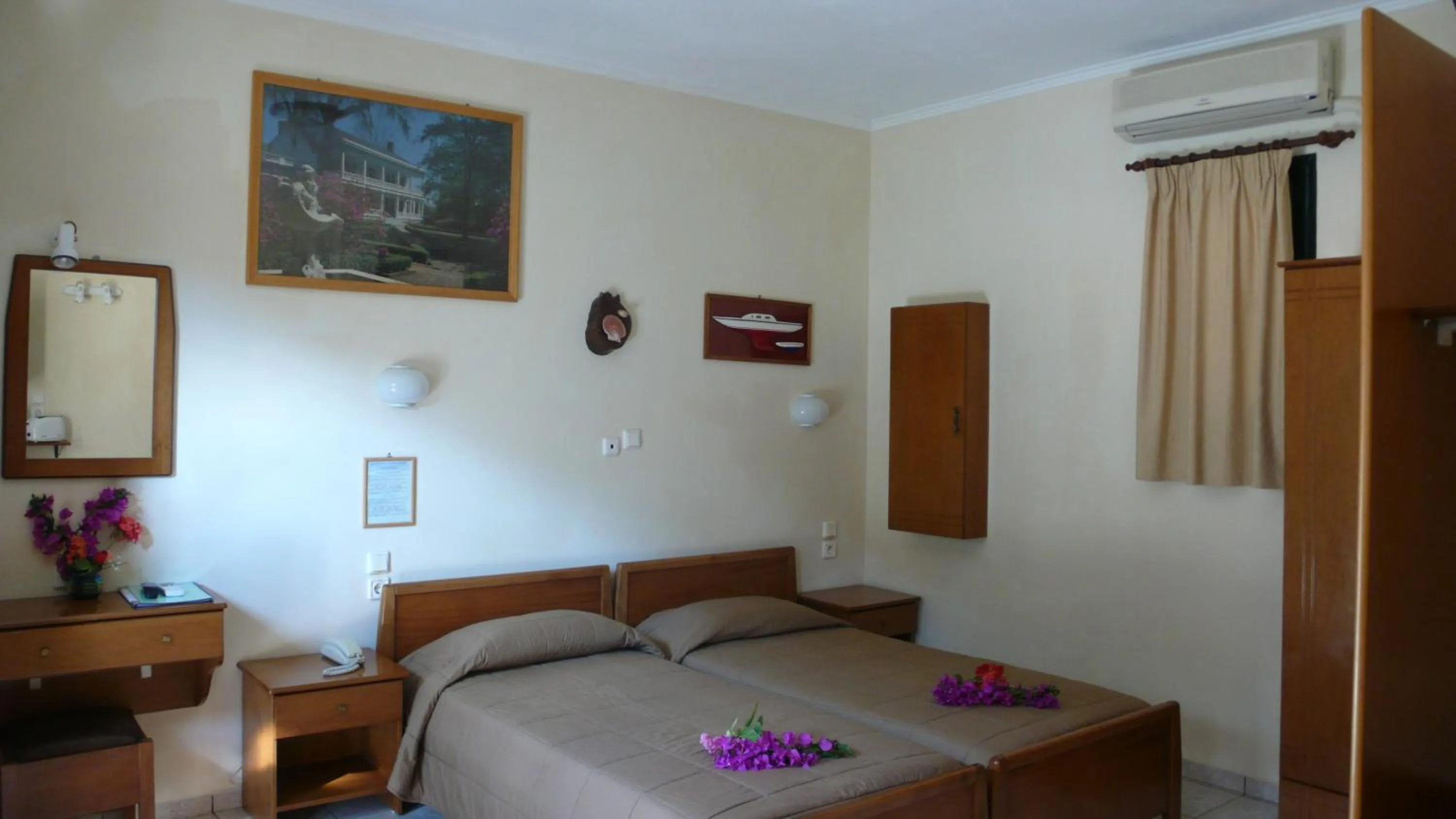 Bed in Aristotelis Apartments