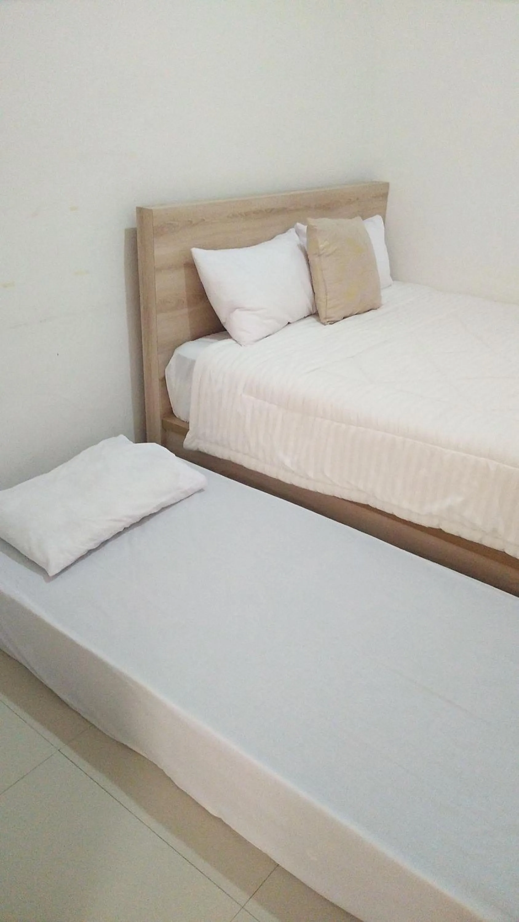 Bed in Wika Bali Beach House