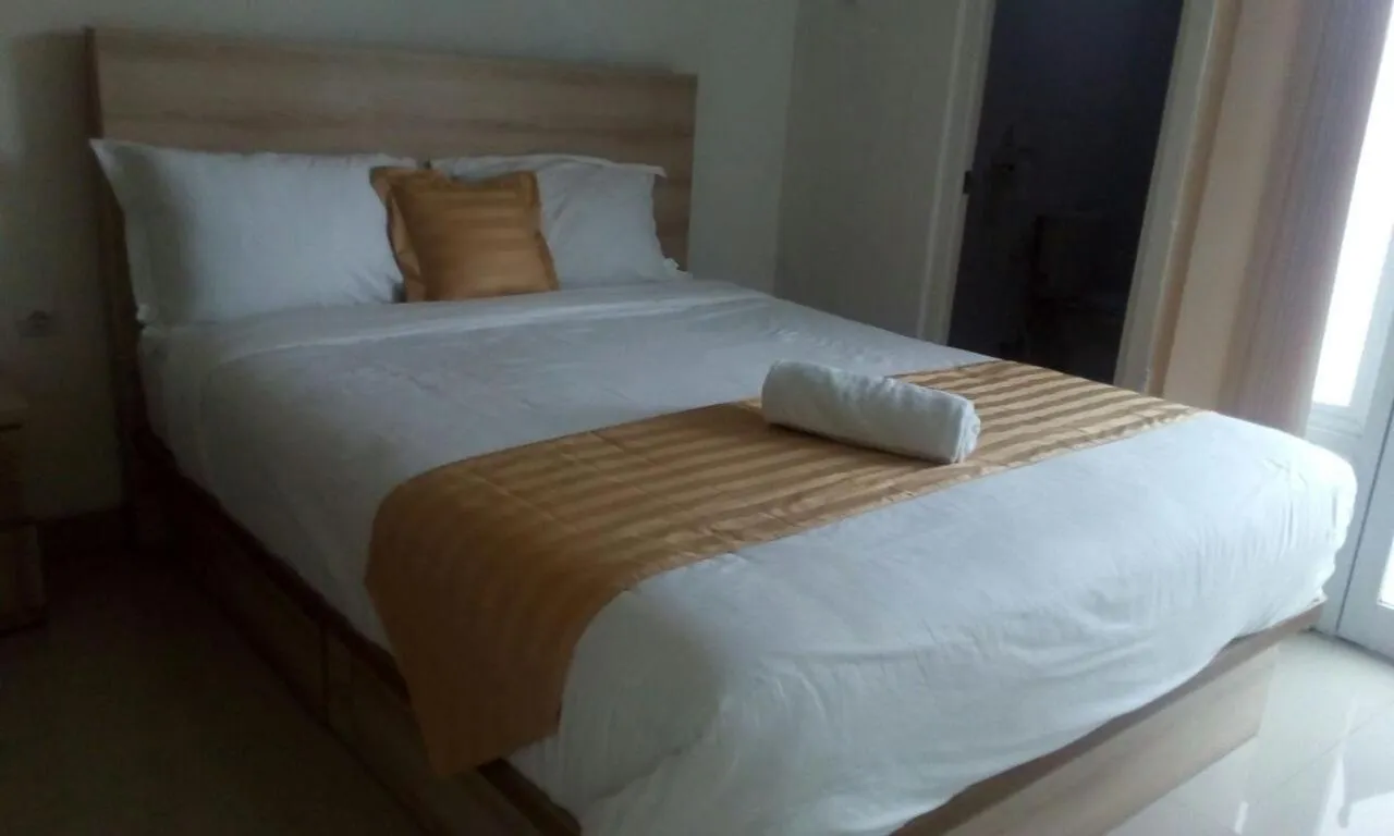 Bed in Wika Bali Beach House