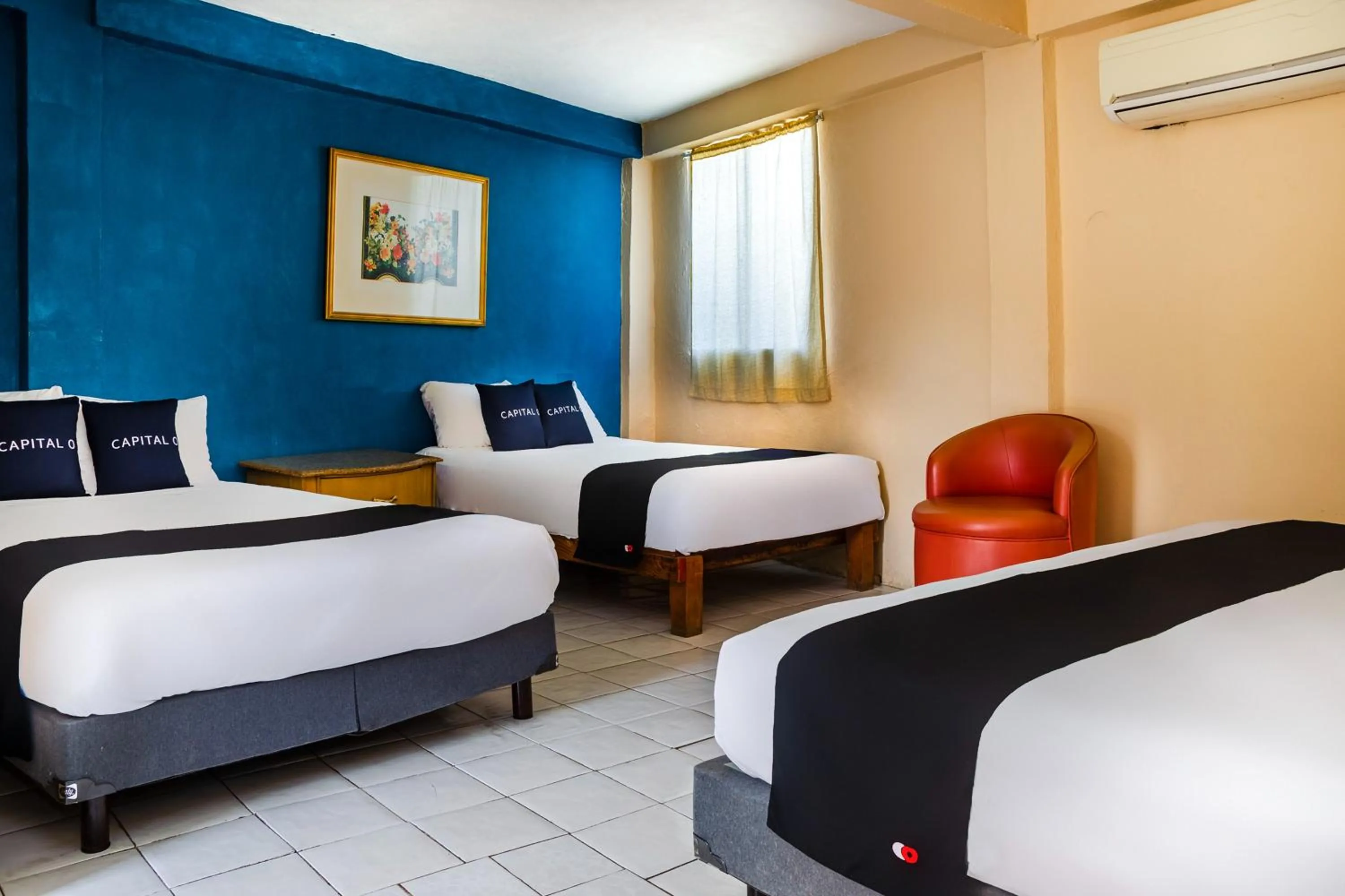 Bedroom, Bed in Capital O Hotel Dos Mares, Cabo San Lucas