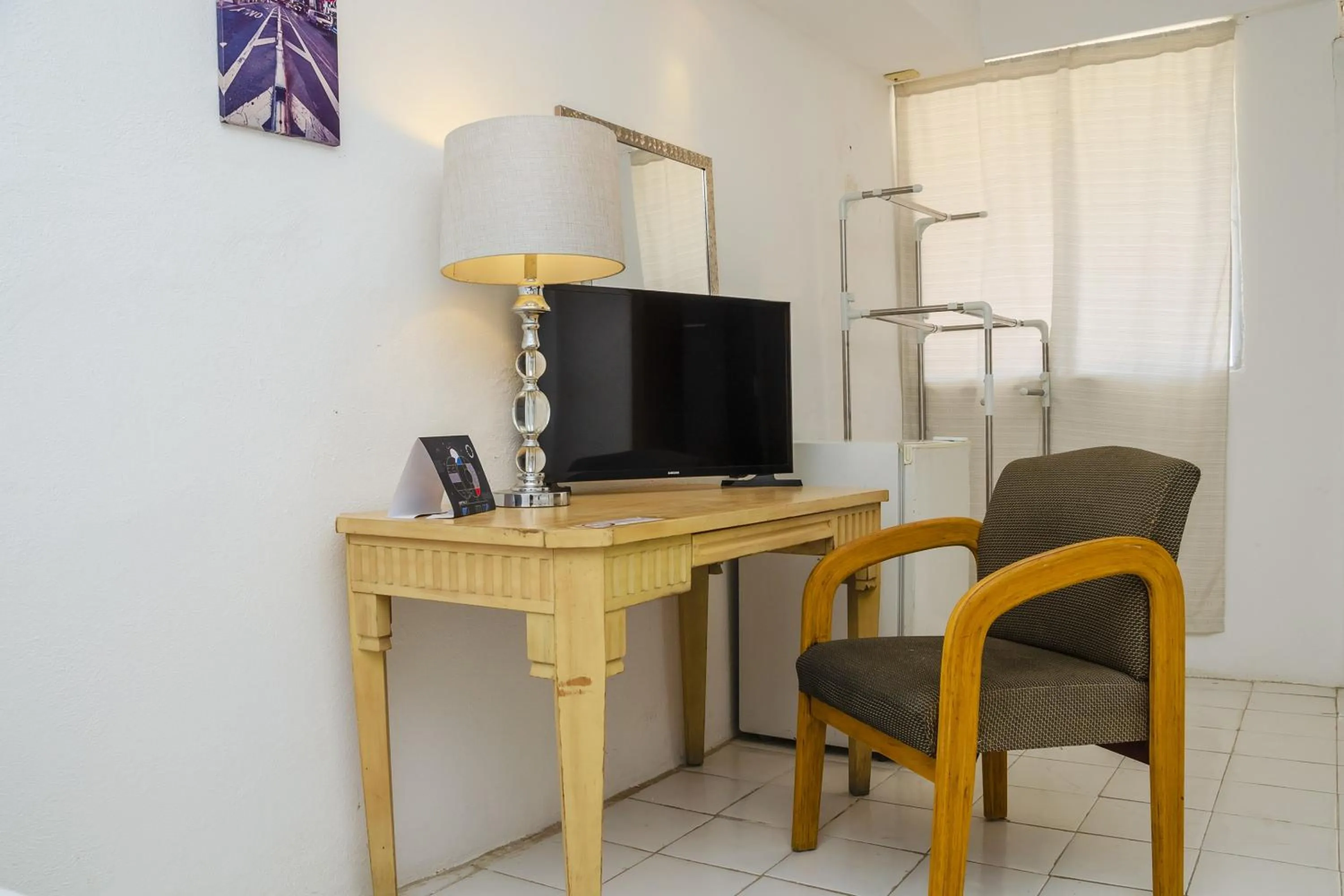 TV and multimedia in Capital O Hotel Dos Mares, Cabo San Lucas