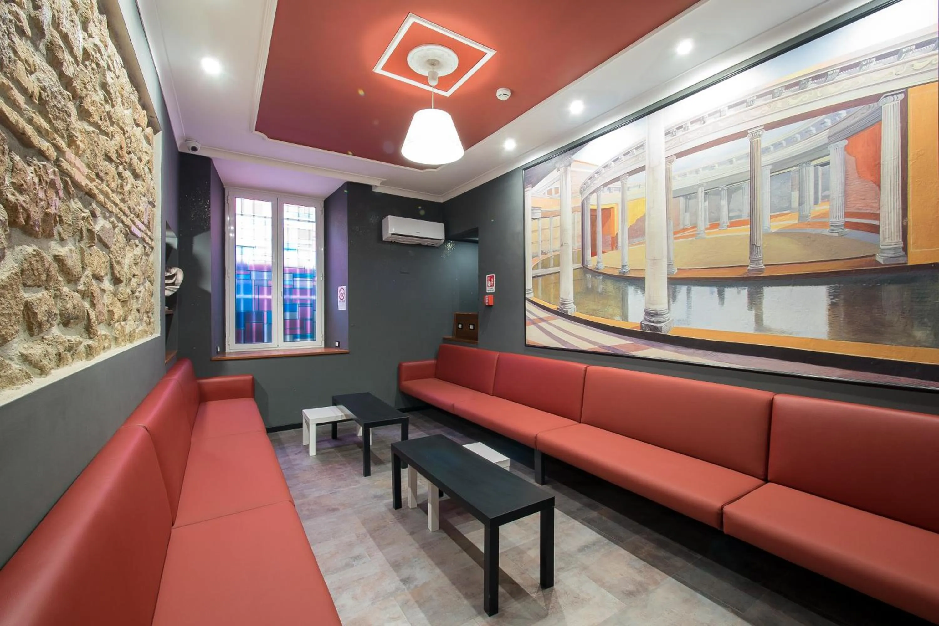 Communal lounge/ TV room in Alessandro Palace & Bar