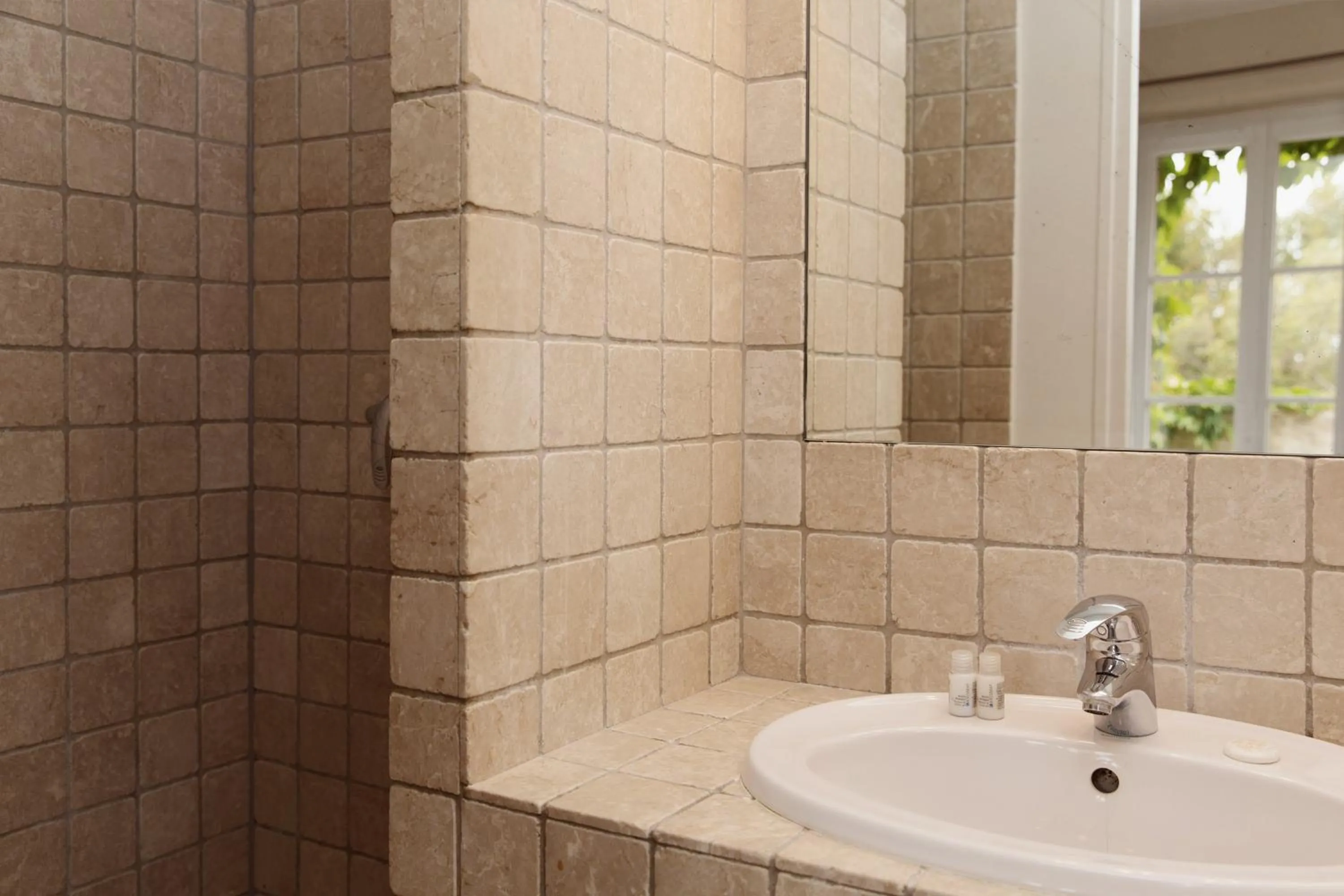 Bathroom in Coq Hotel