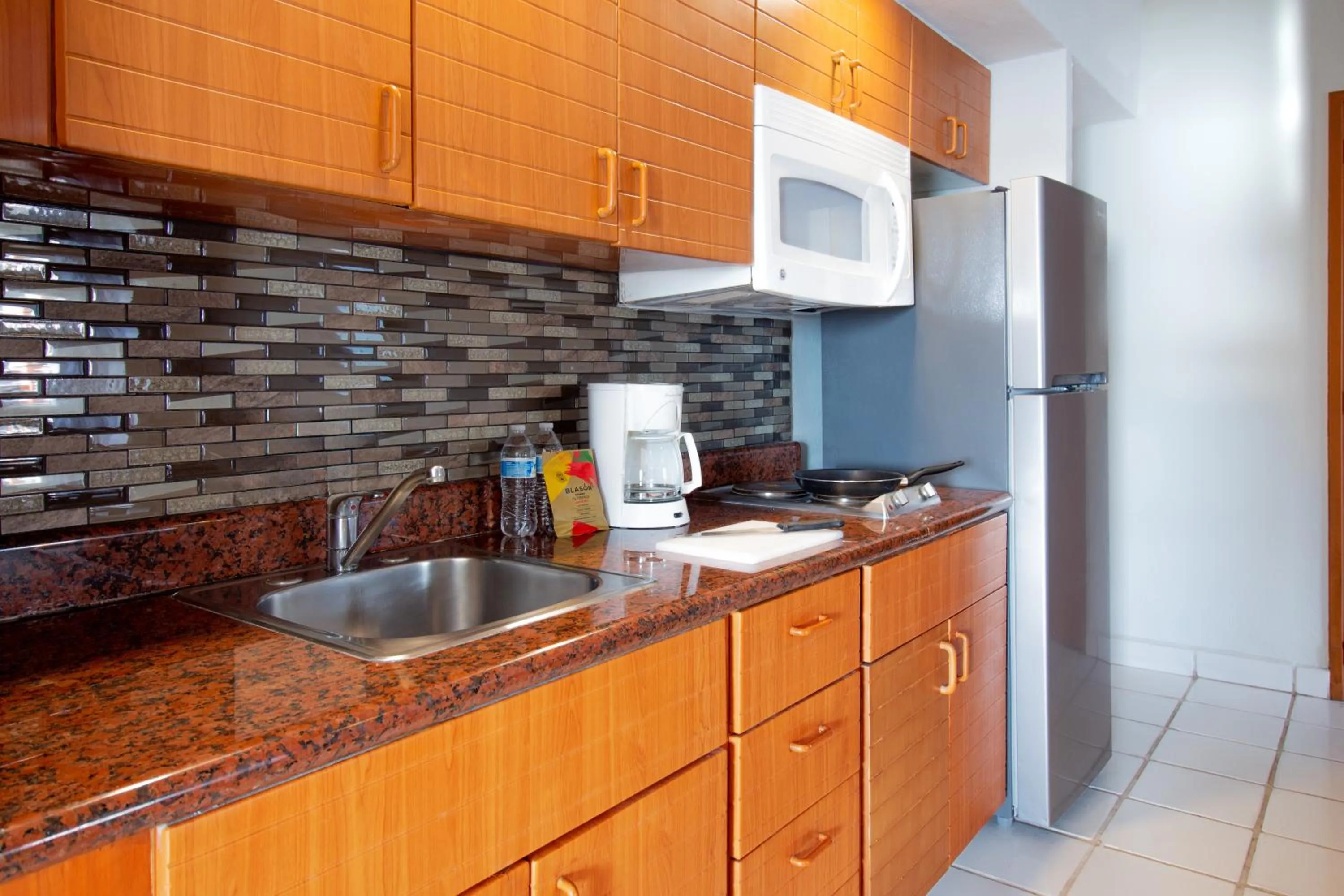 Kitchen or kitchenette in Plaza Pelicanos Club Beach Resort All Inclusive