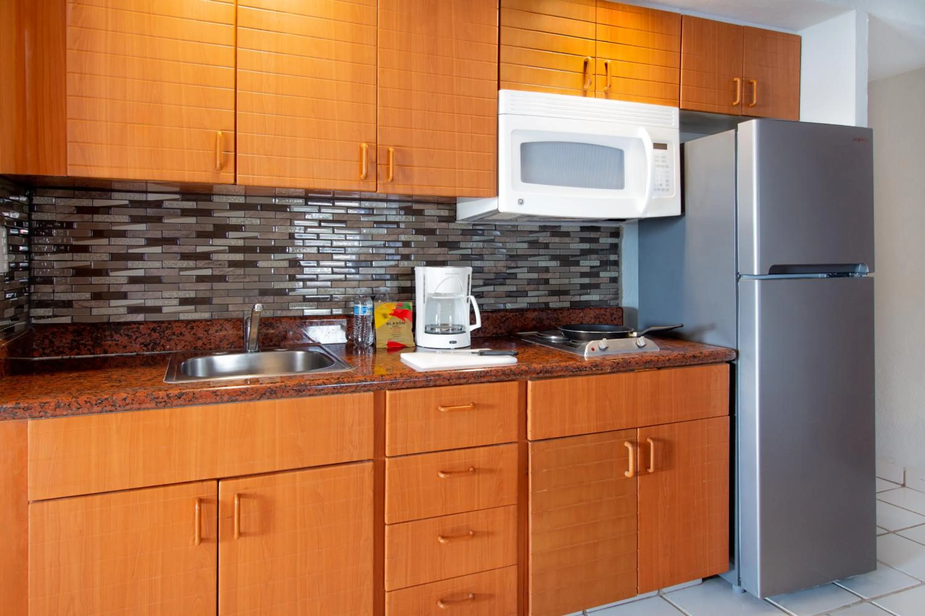 Kitchen or kitchenette in Plaza Pelicanos Club Beach Resort All Inclusive