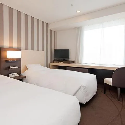 Bed in Hotel Granvia Osaka-JR Hotel Group