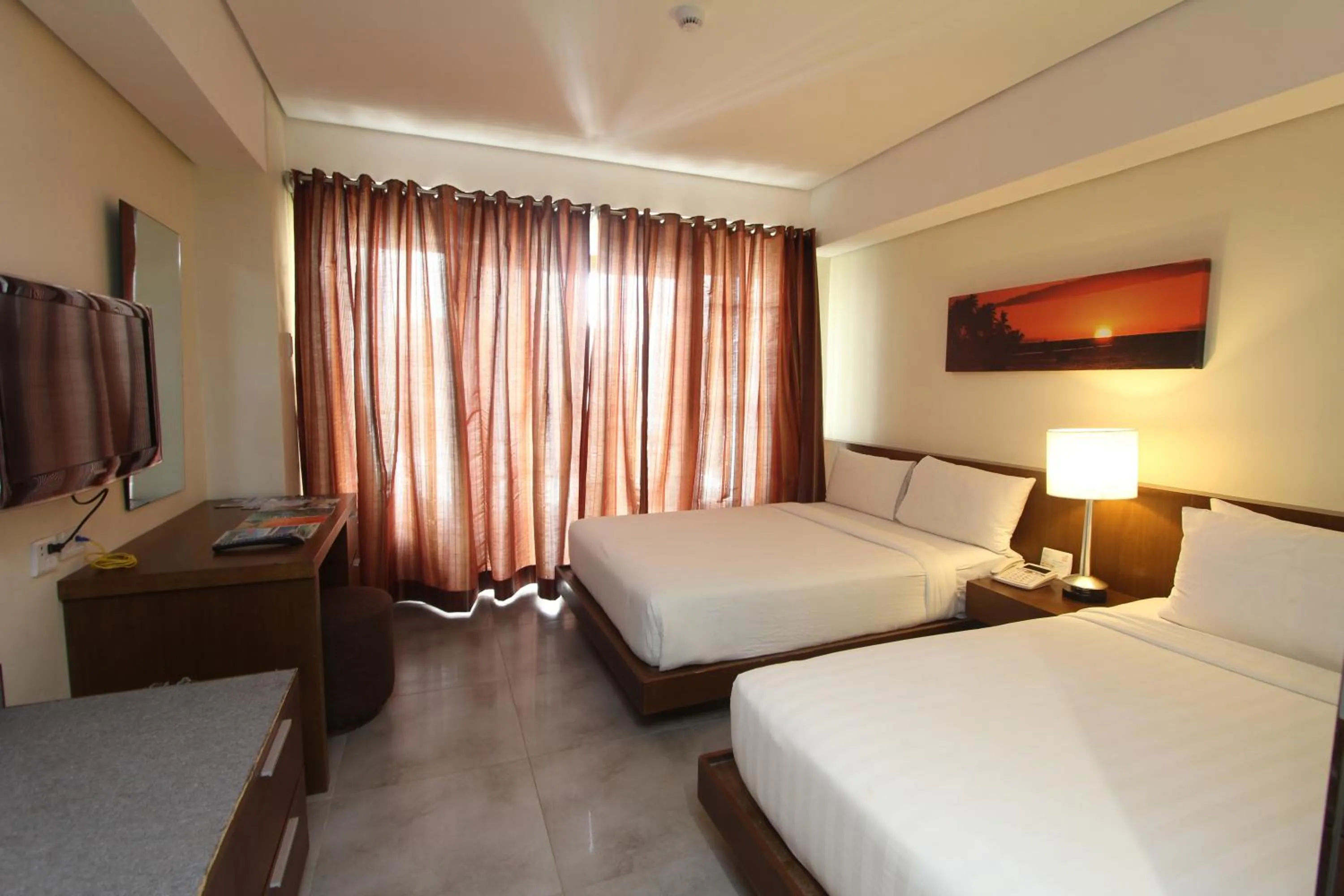 Bedroom, Bed in Crown Regency Beach Resort