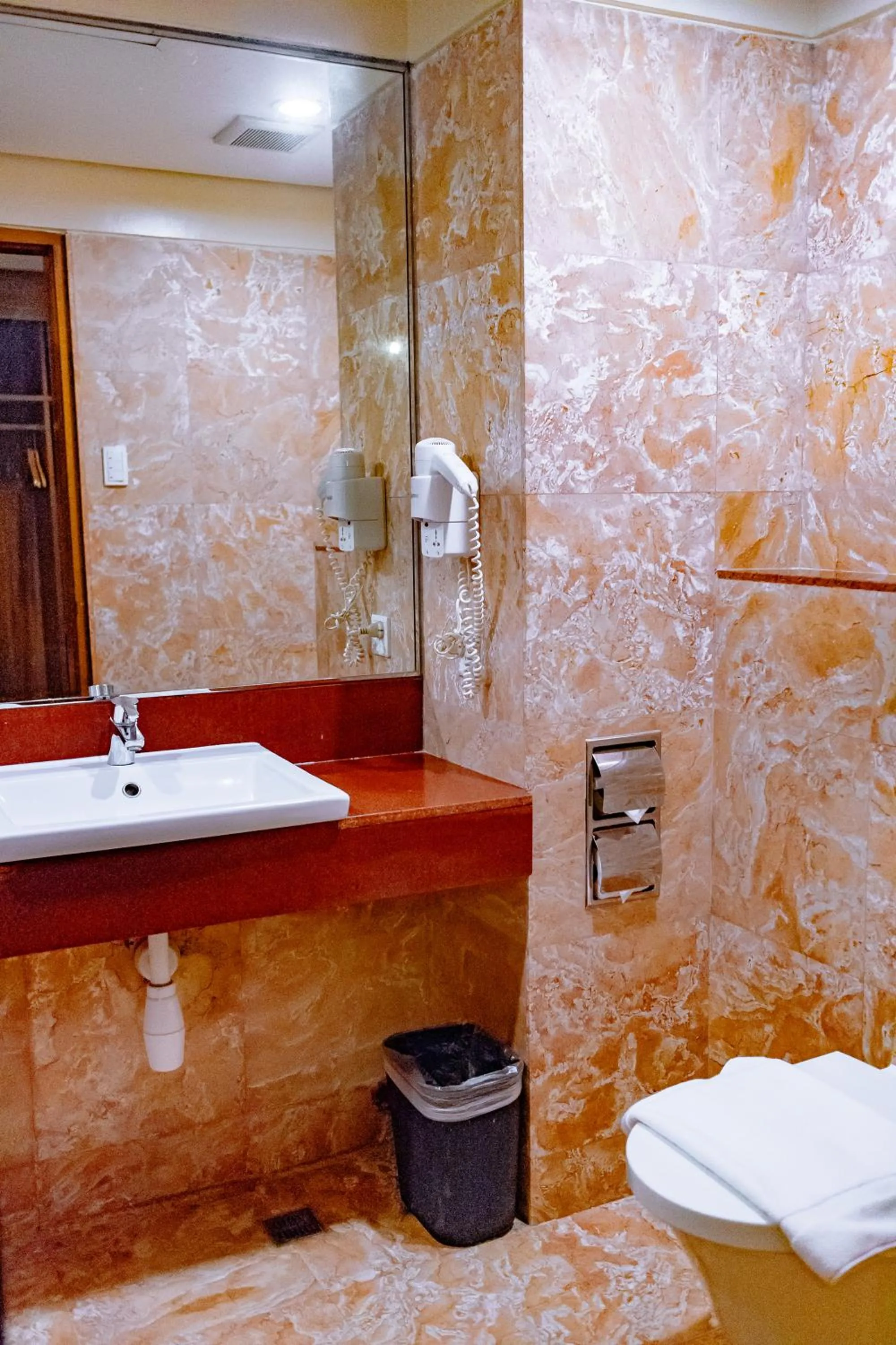 Toilet in Crown Regency Beach Resort