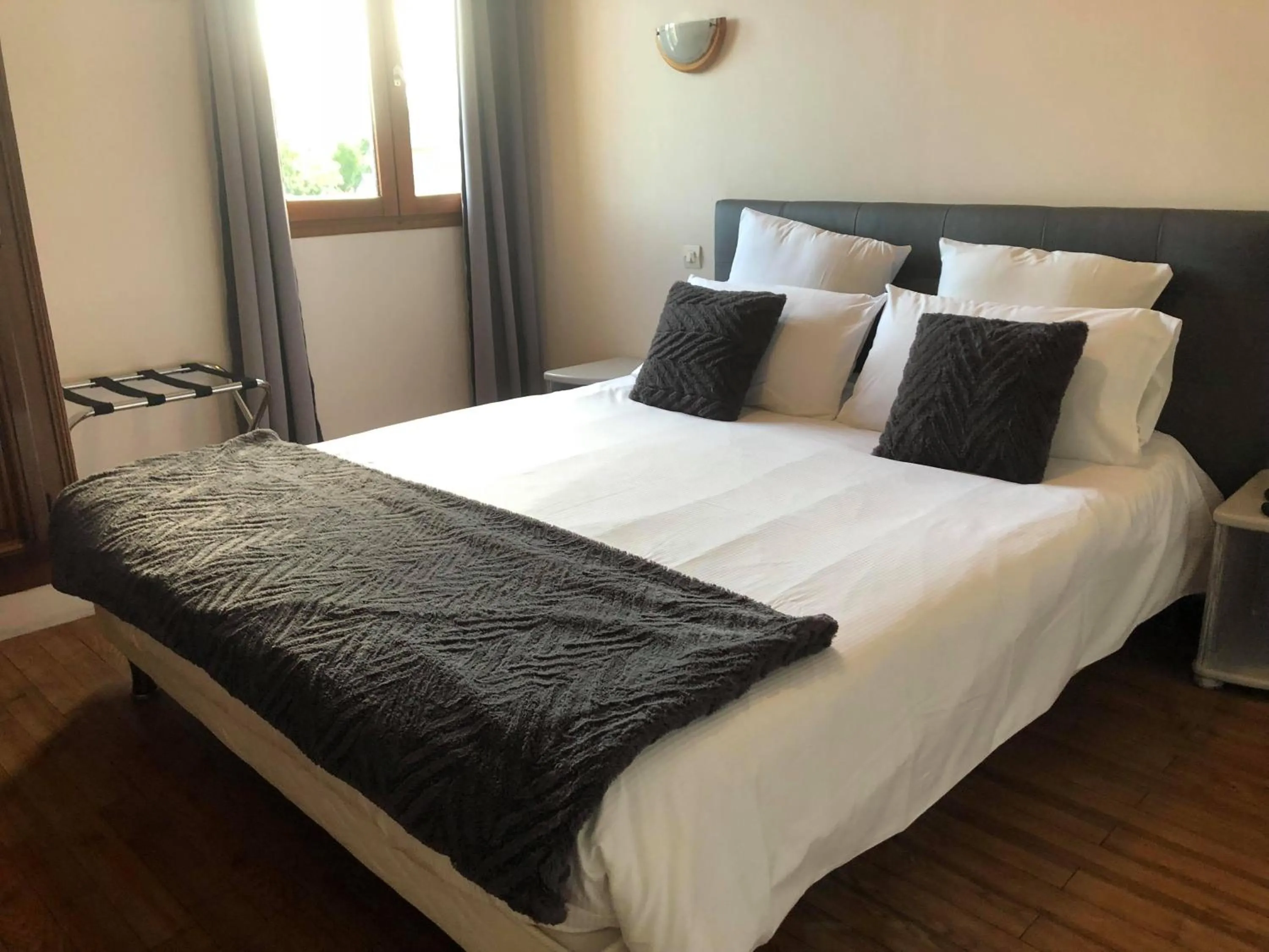 Bed in Logis Hôtel Restaurant - Le Clos Deauville Saint Gatien