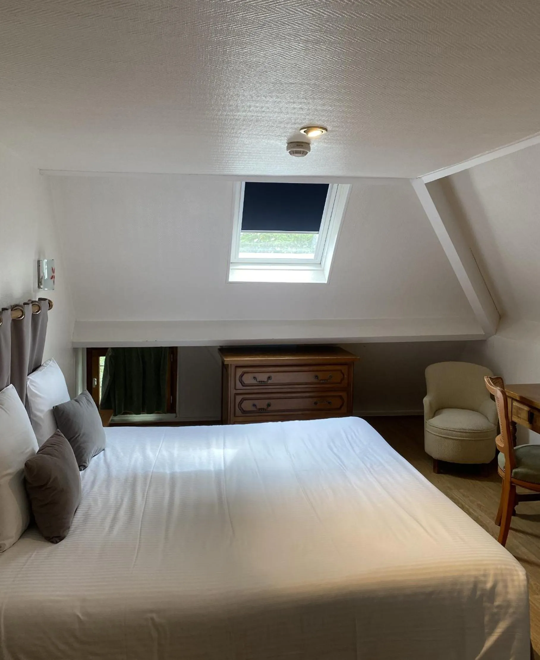 Photo of the whole room, Bed in Logis Hôtel Restaurant - Le Clos Deauville Saint Gatien