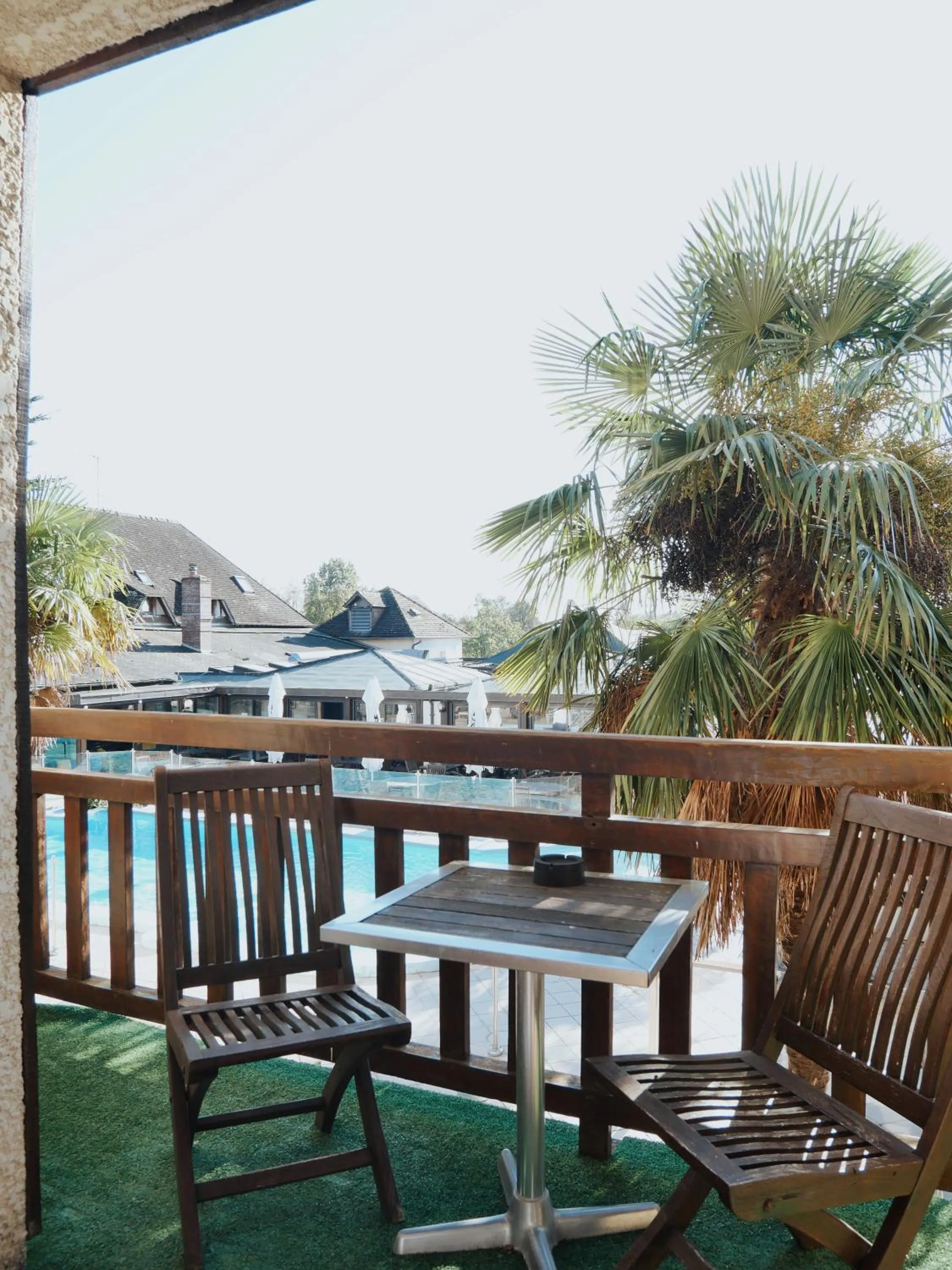 Balcony/Terrace in Logis Hôtel Restaurant - Le Clos Deauville Saint Gatien