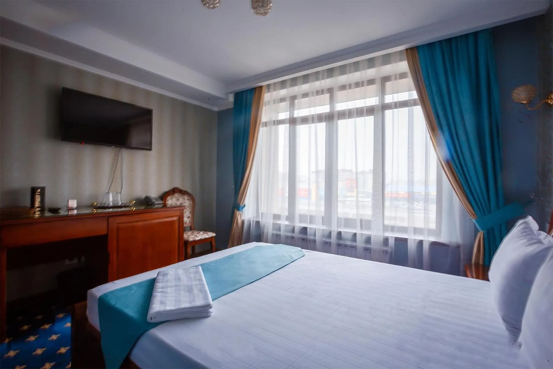 Bed in Salut Hotel Almaty