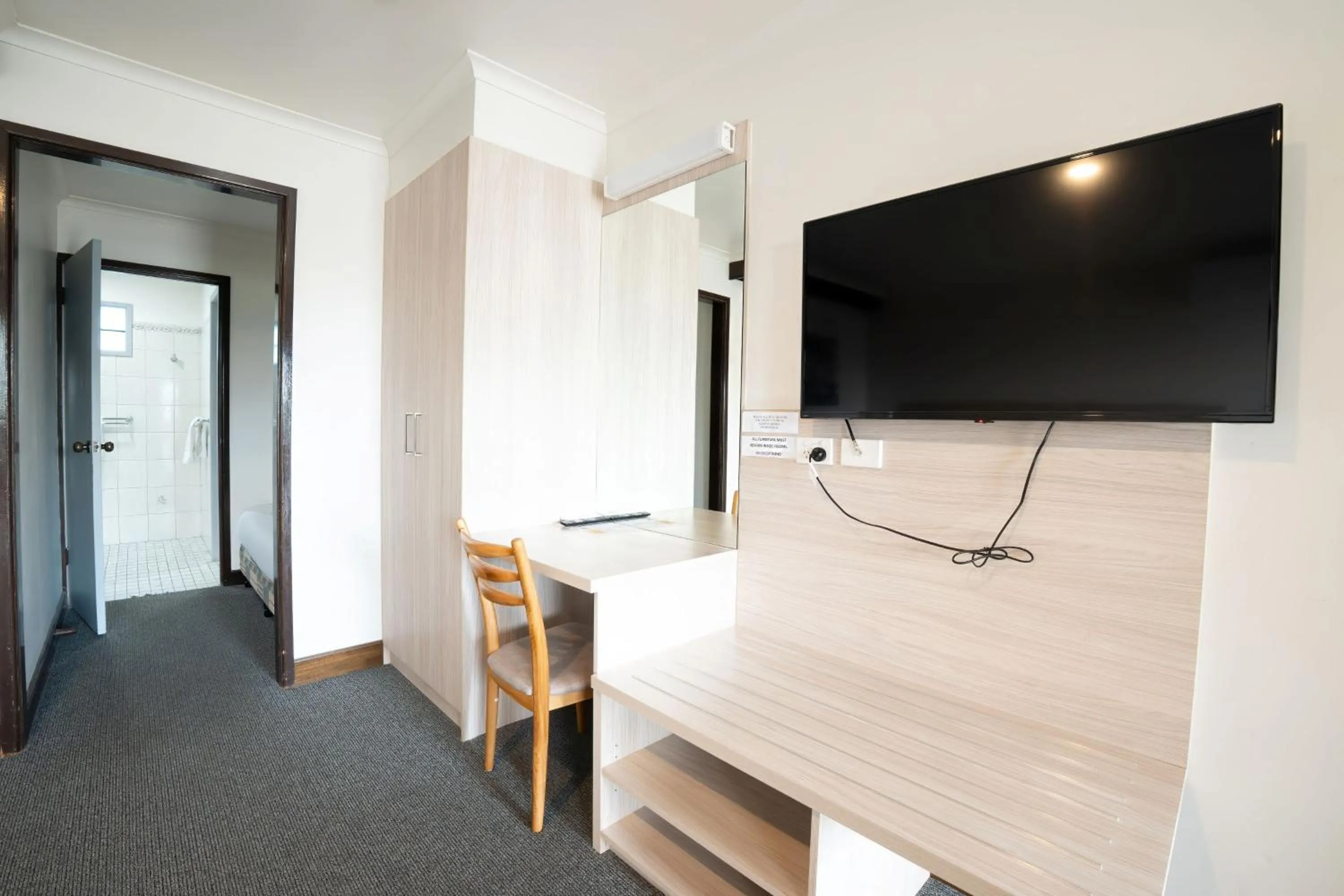 Communal lounge/ TV room in Olde Tudor Hotel