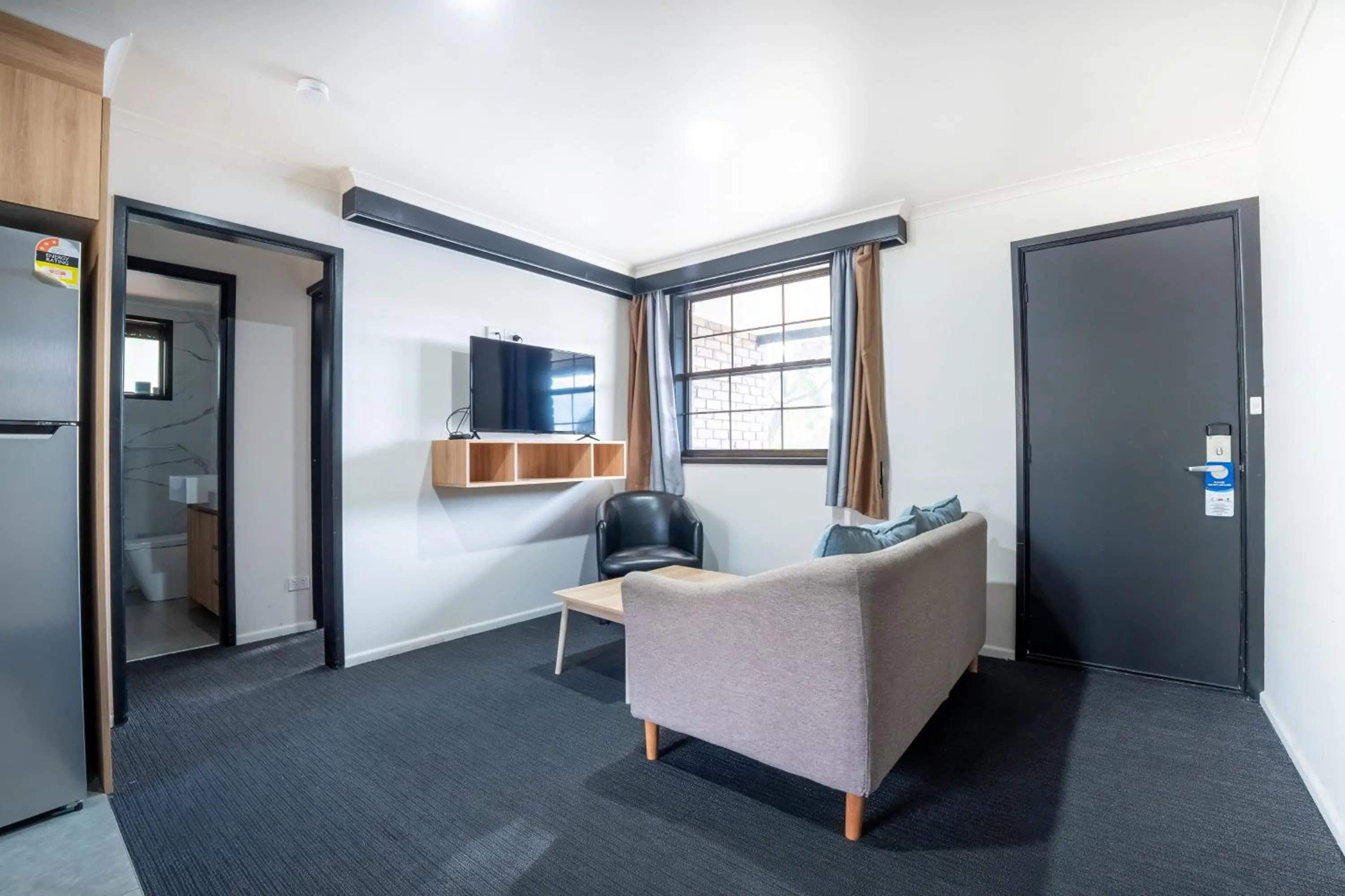 Communal lounge/ TV room in Olde Tudor Hotel