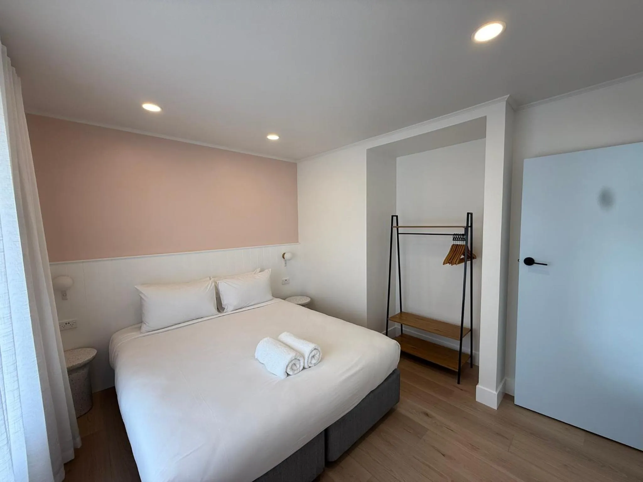 Bed in ASURE Fountain Resort Motel