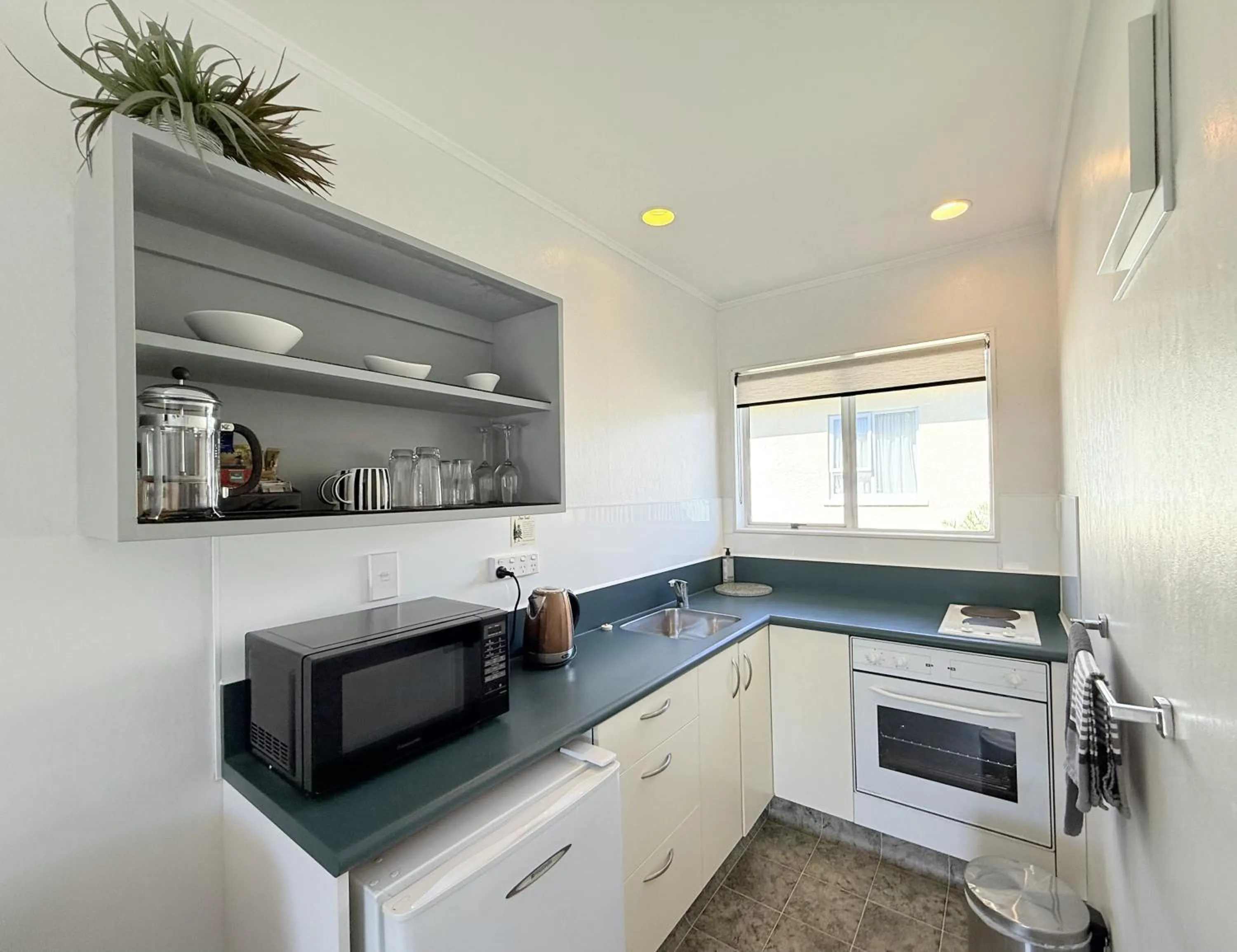 Kitchen or kitchenette in ASURE Fountain Resort Motel