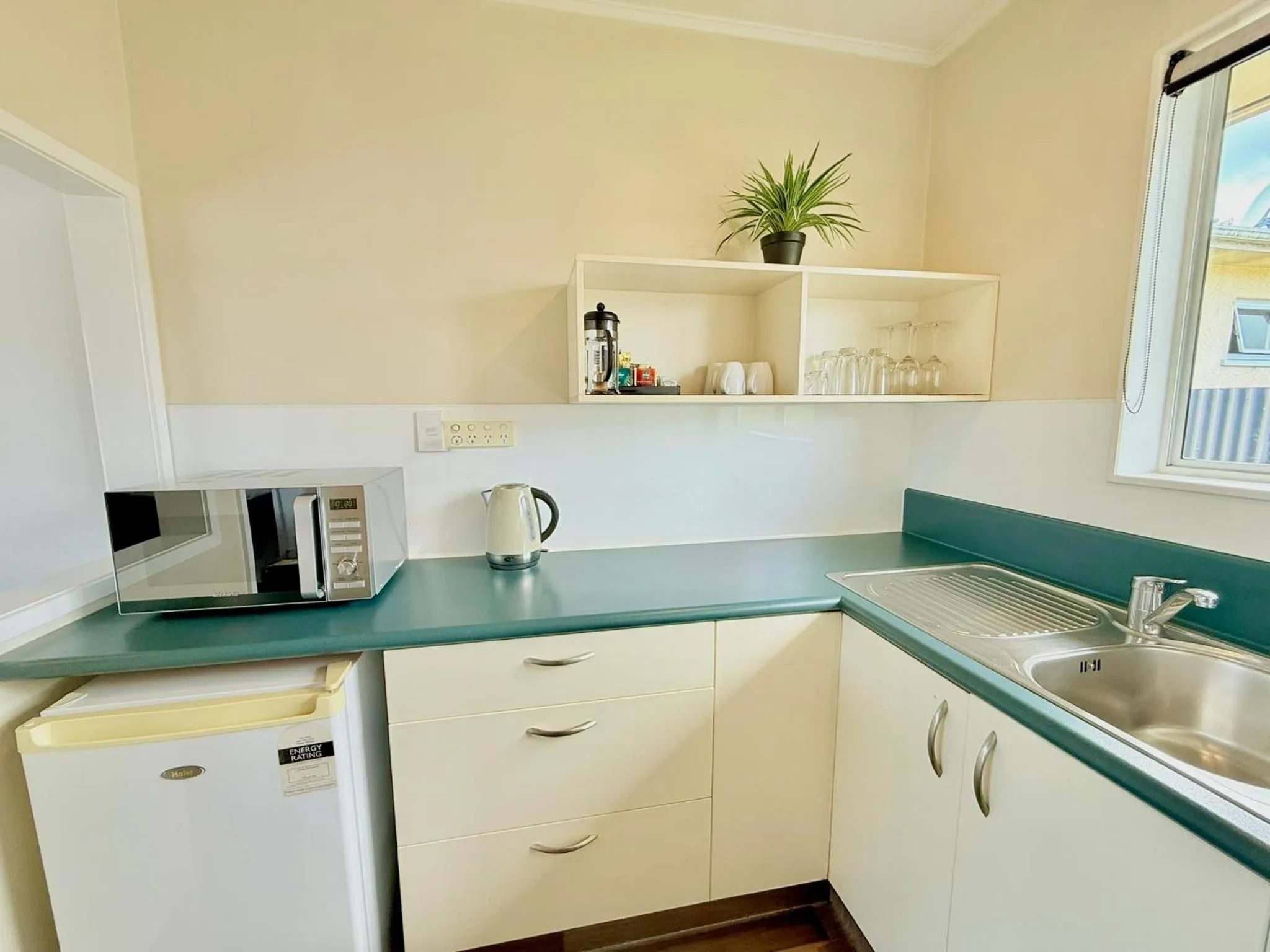 Kitchen or kitchenette in ASURE Fountain Resort Motel
