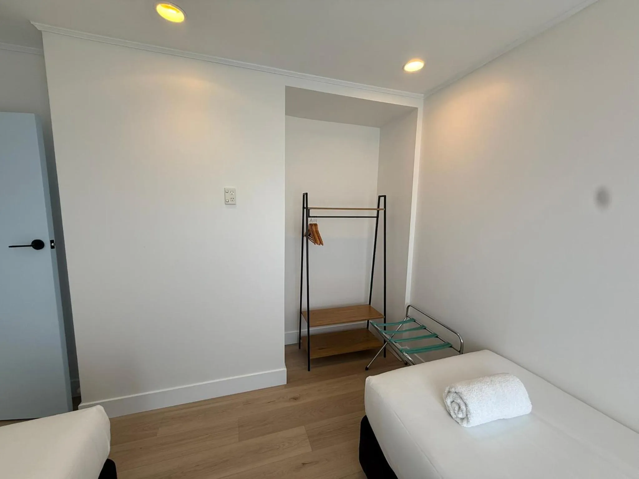 Bed in ASURE Fountain Resort Motel