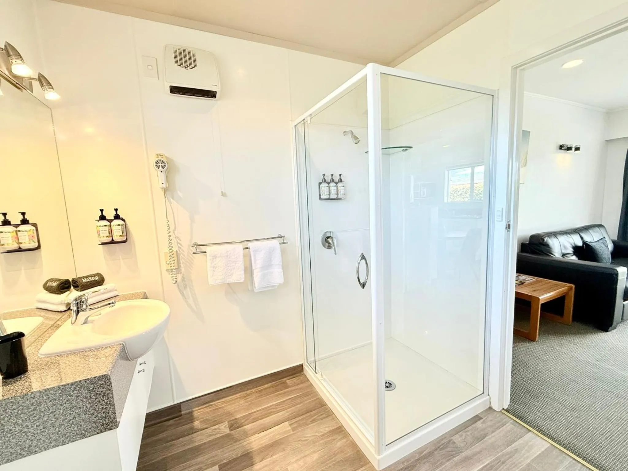 Shower in ASURE Fountain Resort Motel