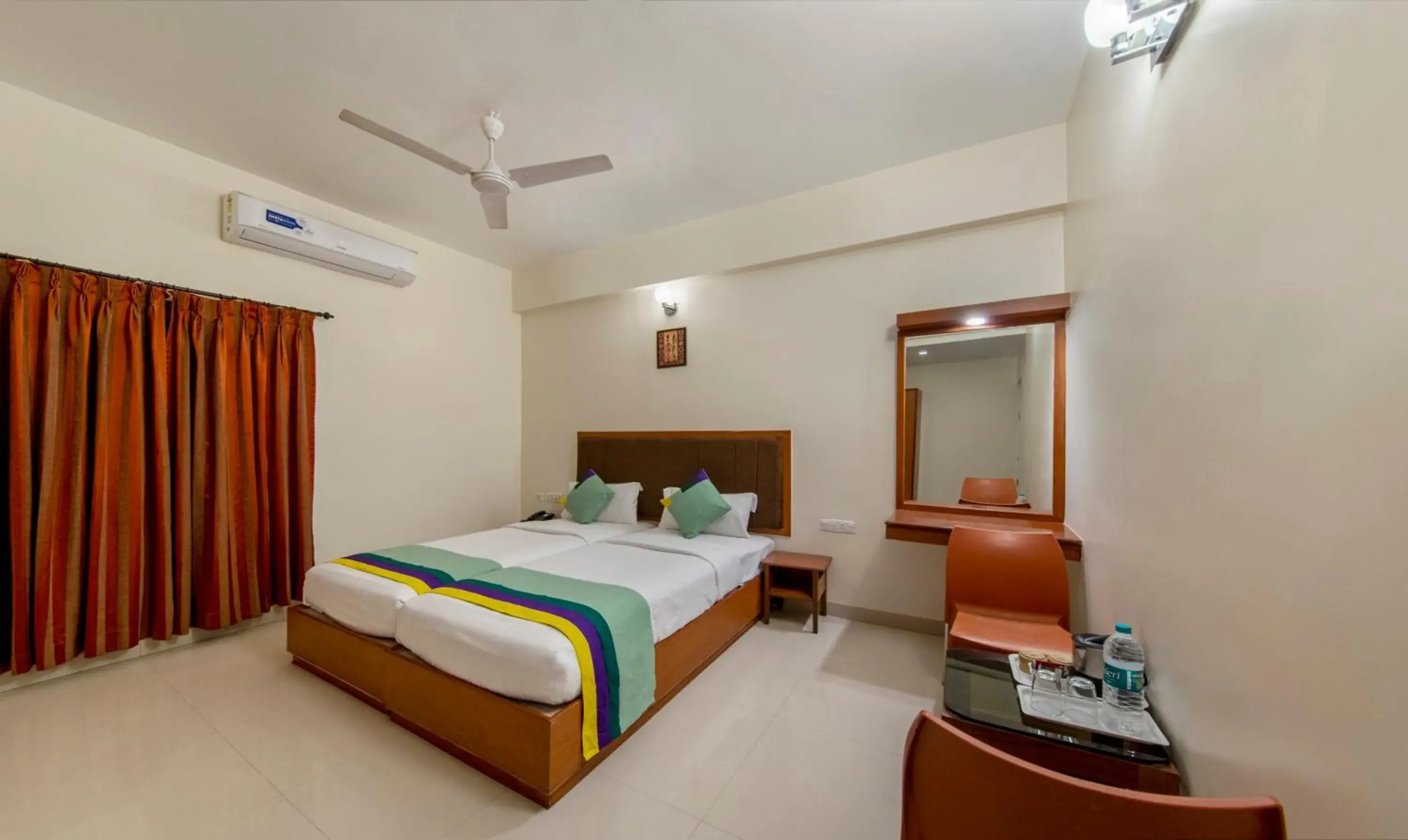 Deluxe Double Room - single occupancy in Treebo Sam Residency Deluxe Double Room - single occupancy in Treebo Sam Residency