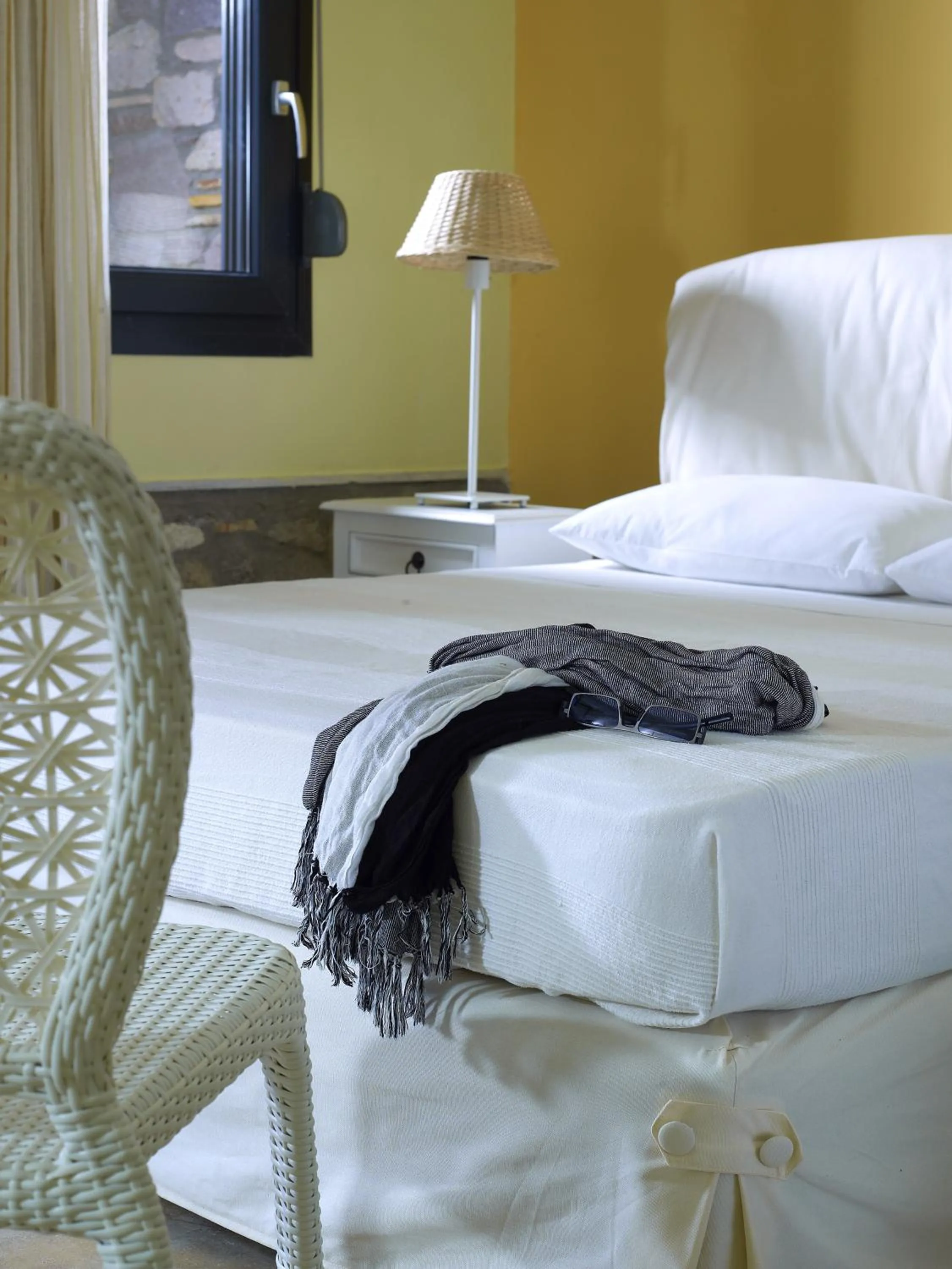 Bed in Aeolis Apartments & Studios